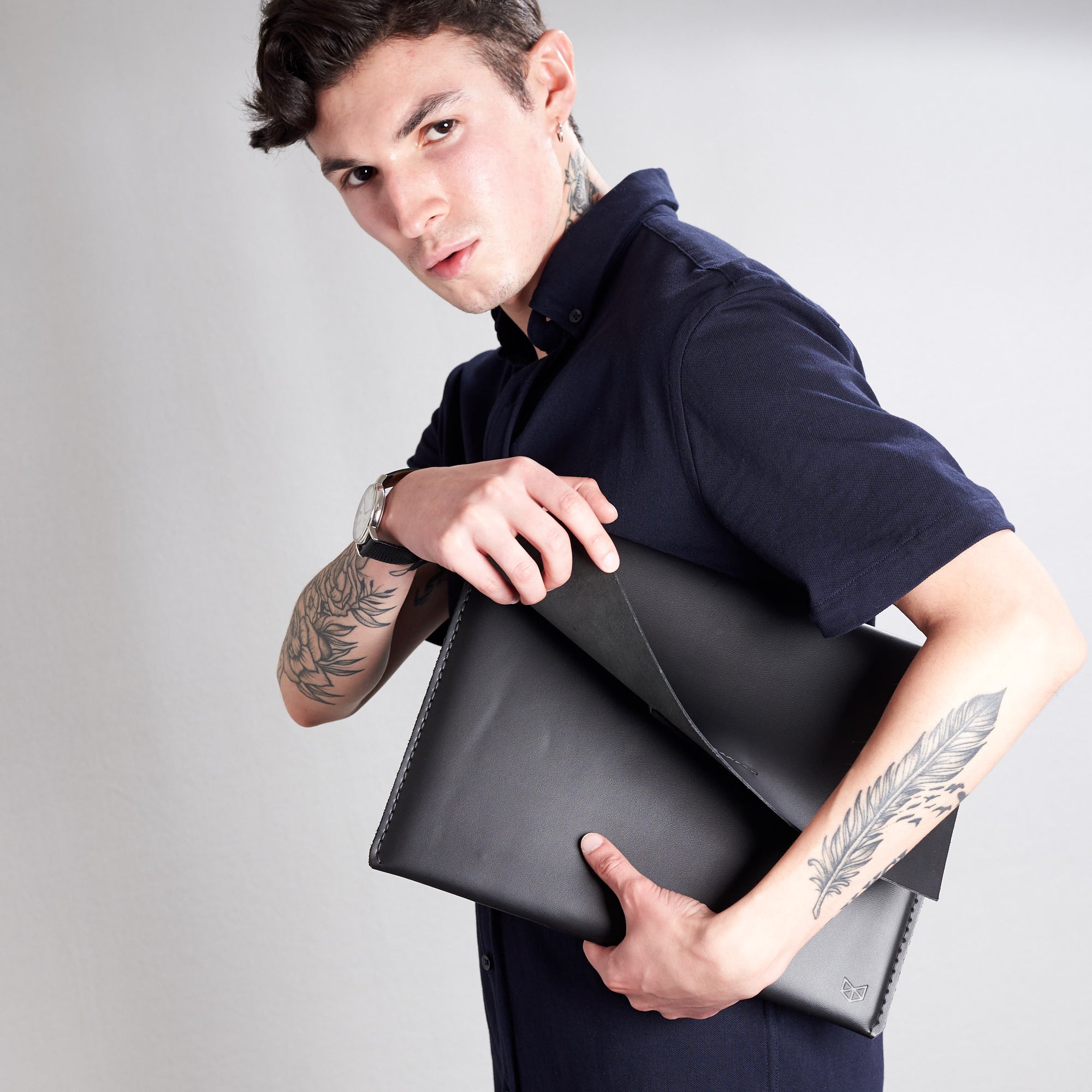 Style suede detail. Black draftsman 1 case by Capra Leather. Microsoft Surface sleeve.