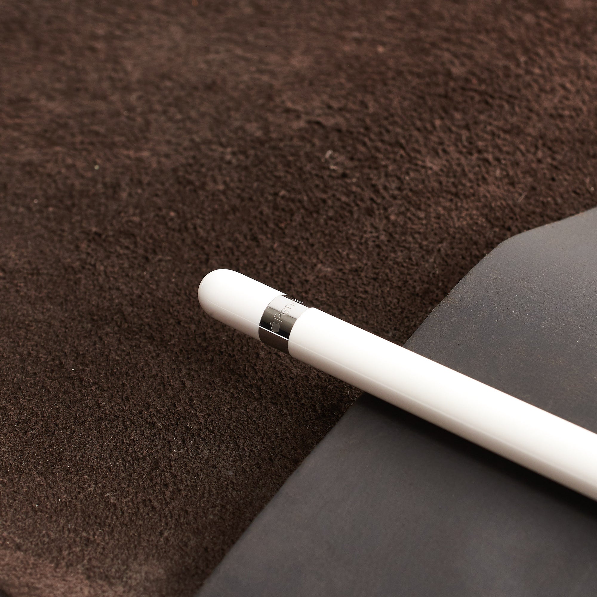 Apple pencil detail. Brown iPad pro leather case with pen holder