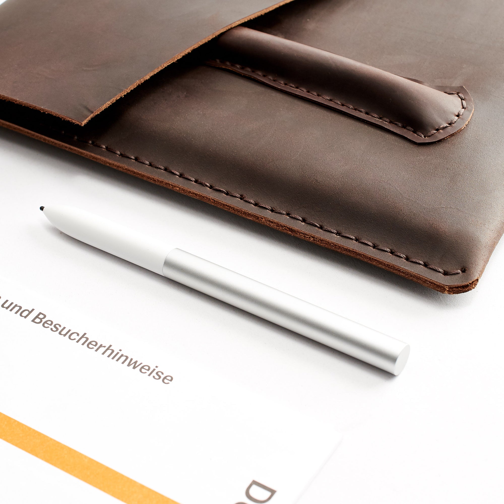 Office desk. Brown leather Google Pixelbook. Mens handmade folio. Sleeve with google pen holder