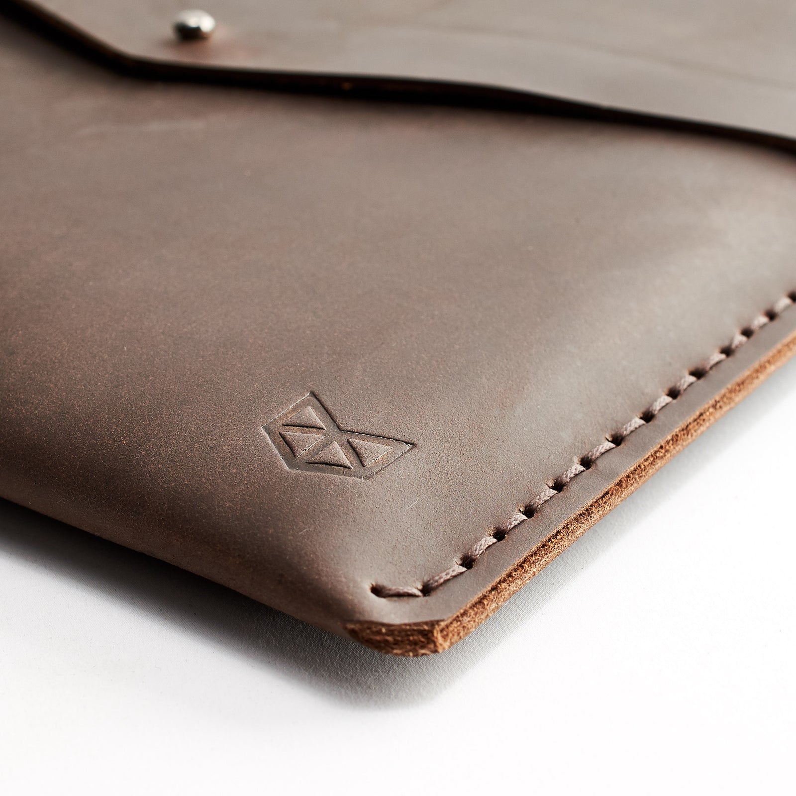 Hand stitch detail. Brown leather Google Pixelbook. Mens handmade folio. Sleeve with google pen holder