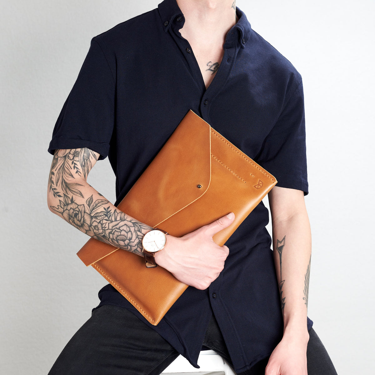 Style front view. Light brown draftsman 5 case by Capra Leather. Google pixel sleeve.