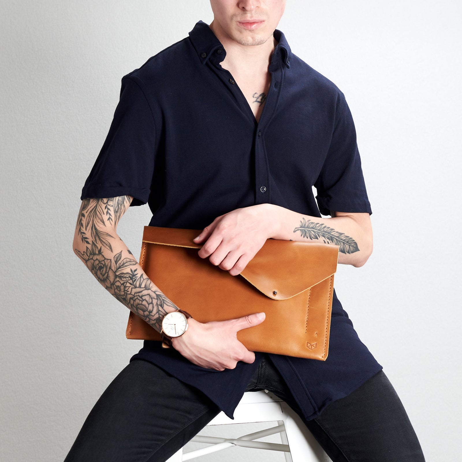 Style holding case. Light brown draftsman 5 case by Capra Leather. Microsoft Surface sleeve.