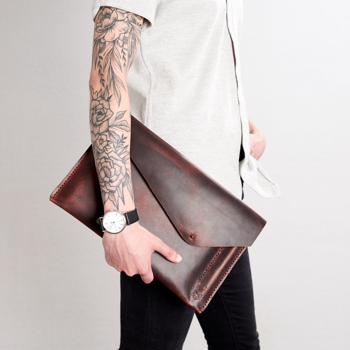 Style front view. Cognac draftsman 5 case by Capra Leather. Microsoft Surface sleeve.