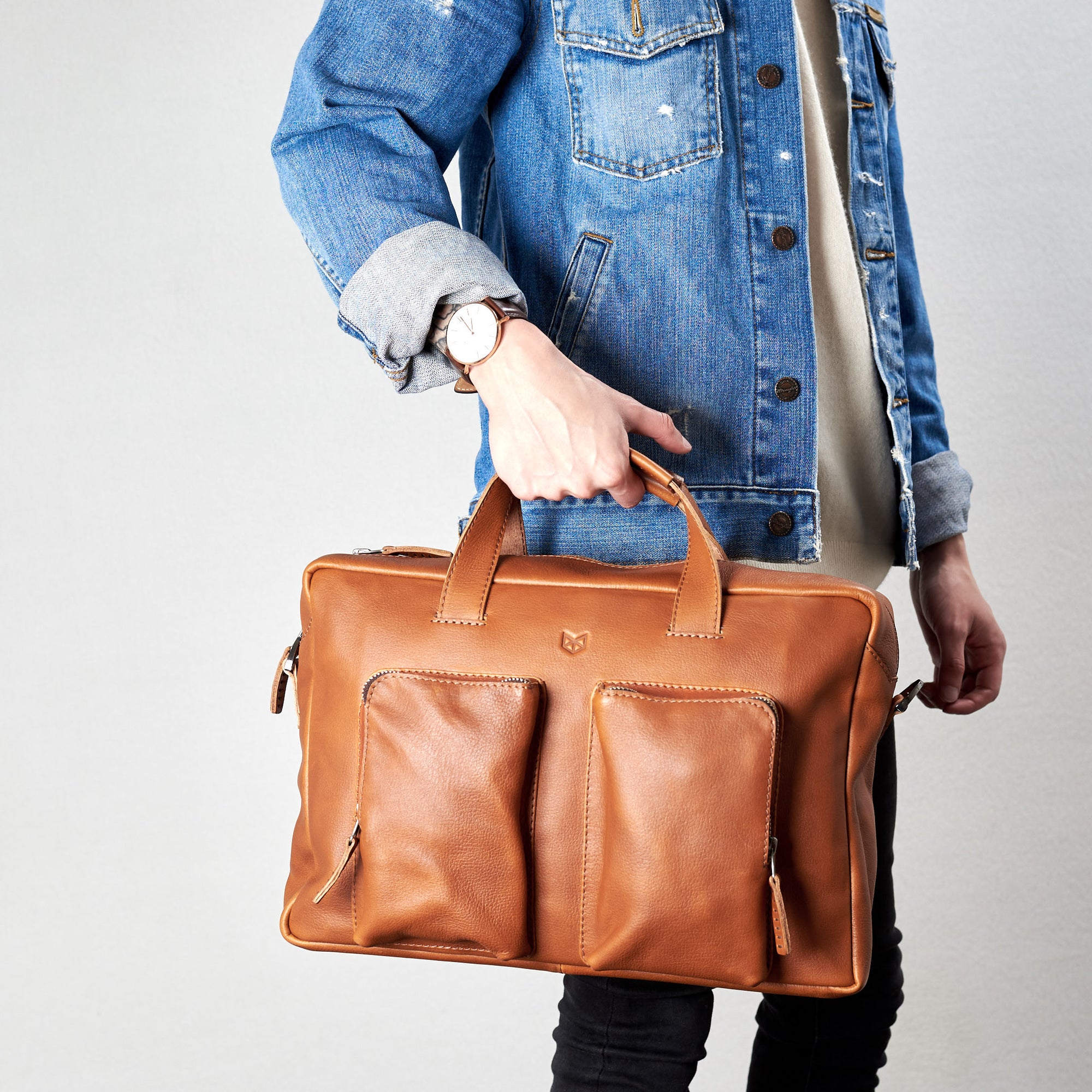 Style handles in use. Tan Equz messenger bag by Capra Leather. 