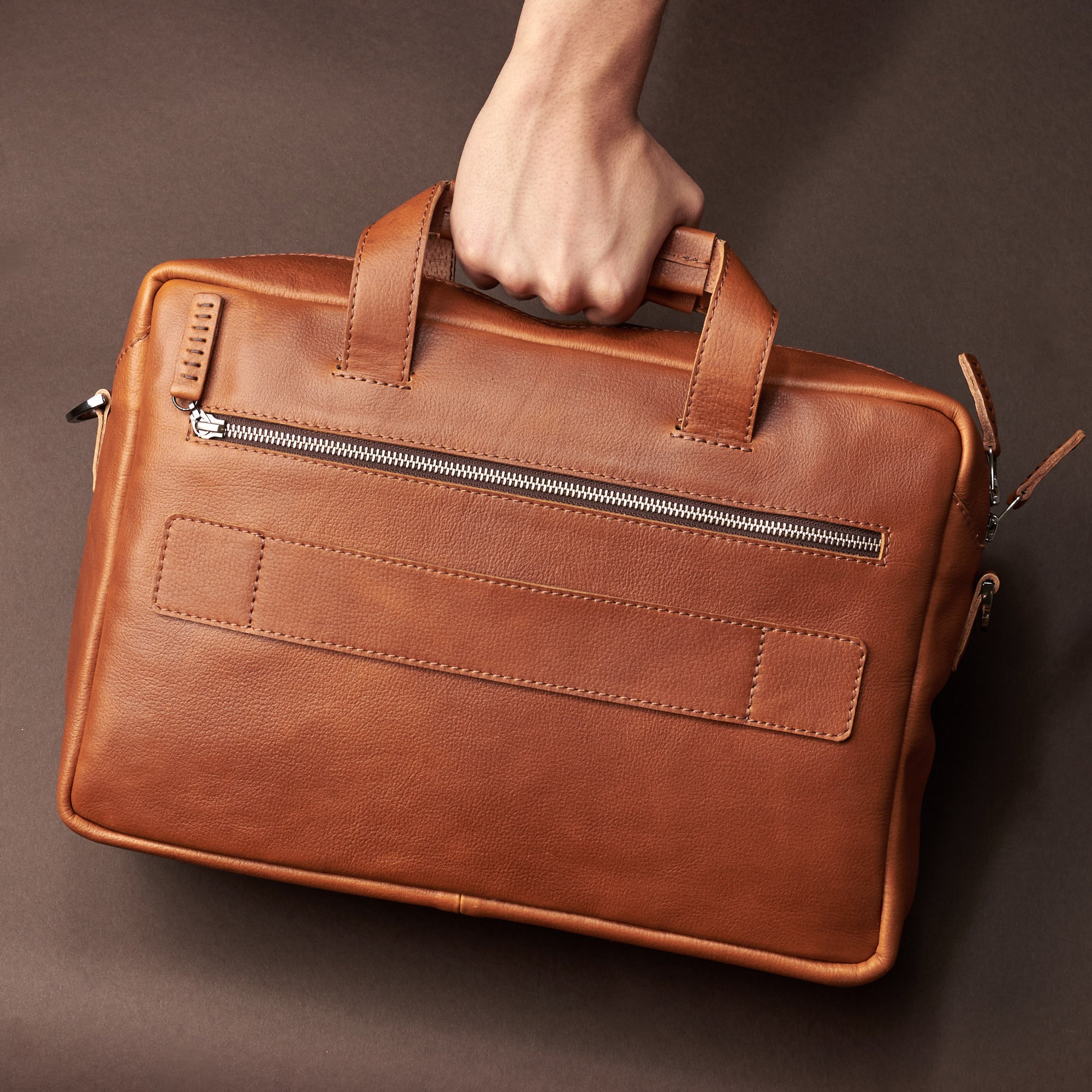 Carrying styling.- Tan handmade leather messenger bag for Men by Capra Leather. Tech bag, mens weekender bag 