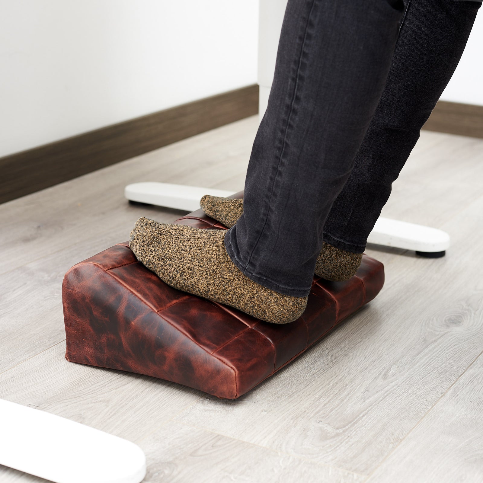 Cover. Ergonomic under desk footrest cover in distressed cognac by Capra Leather