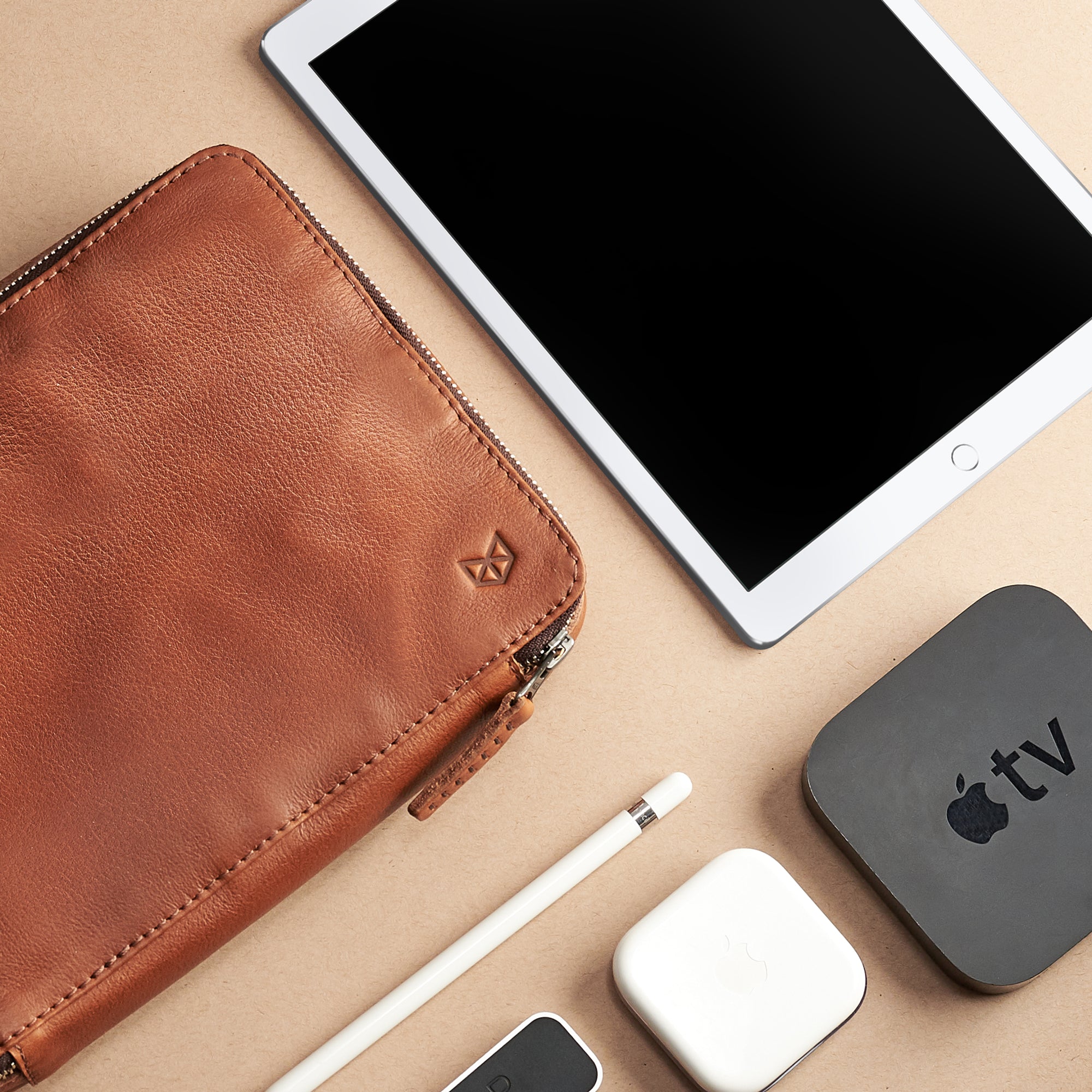 Tan electronic organizer. Leather gadget pouch by Capra. Fits iPad Pro 11 with pencil.