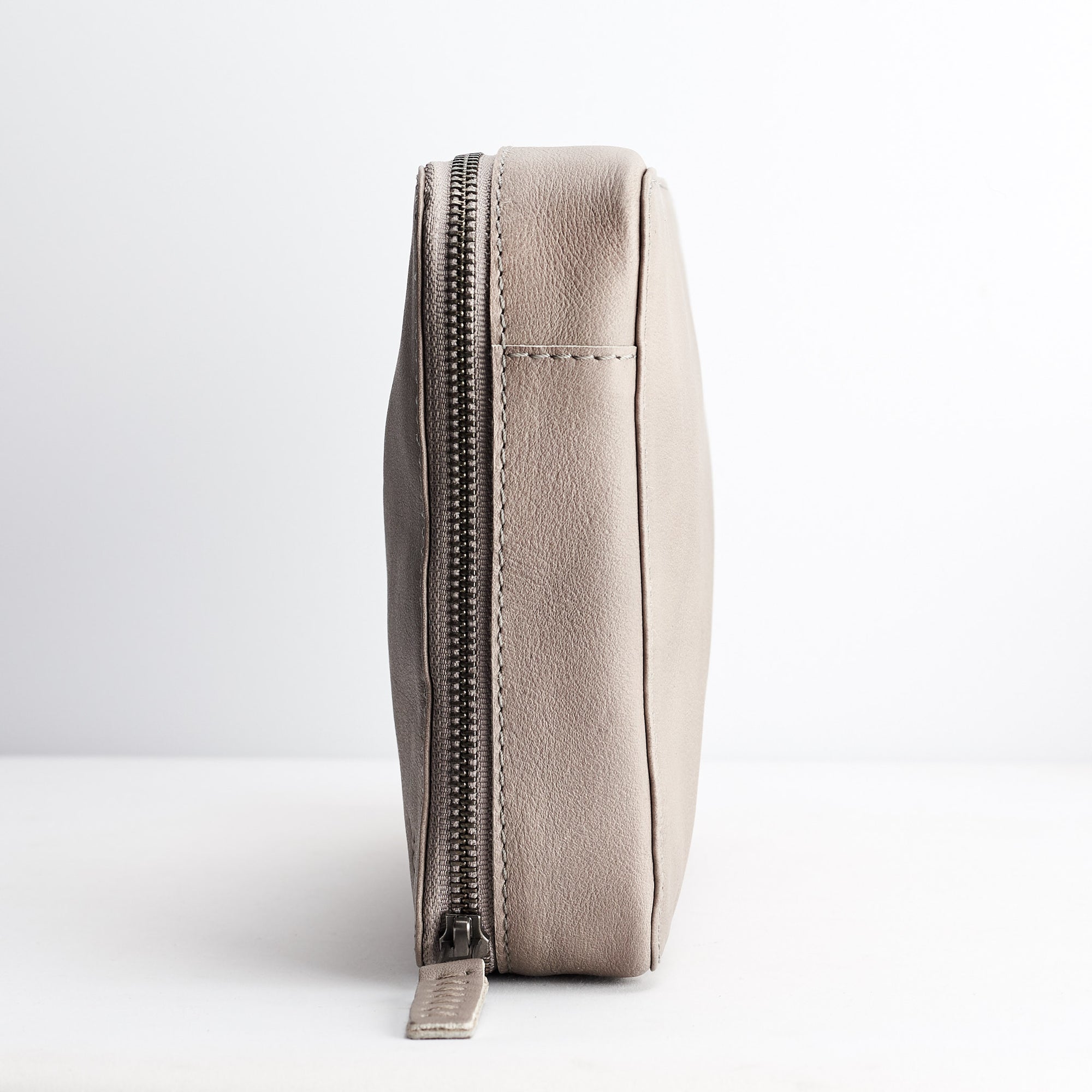 Grey tech gear zipper bag by Capra Leather