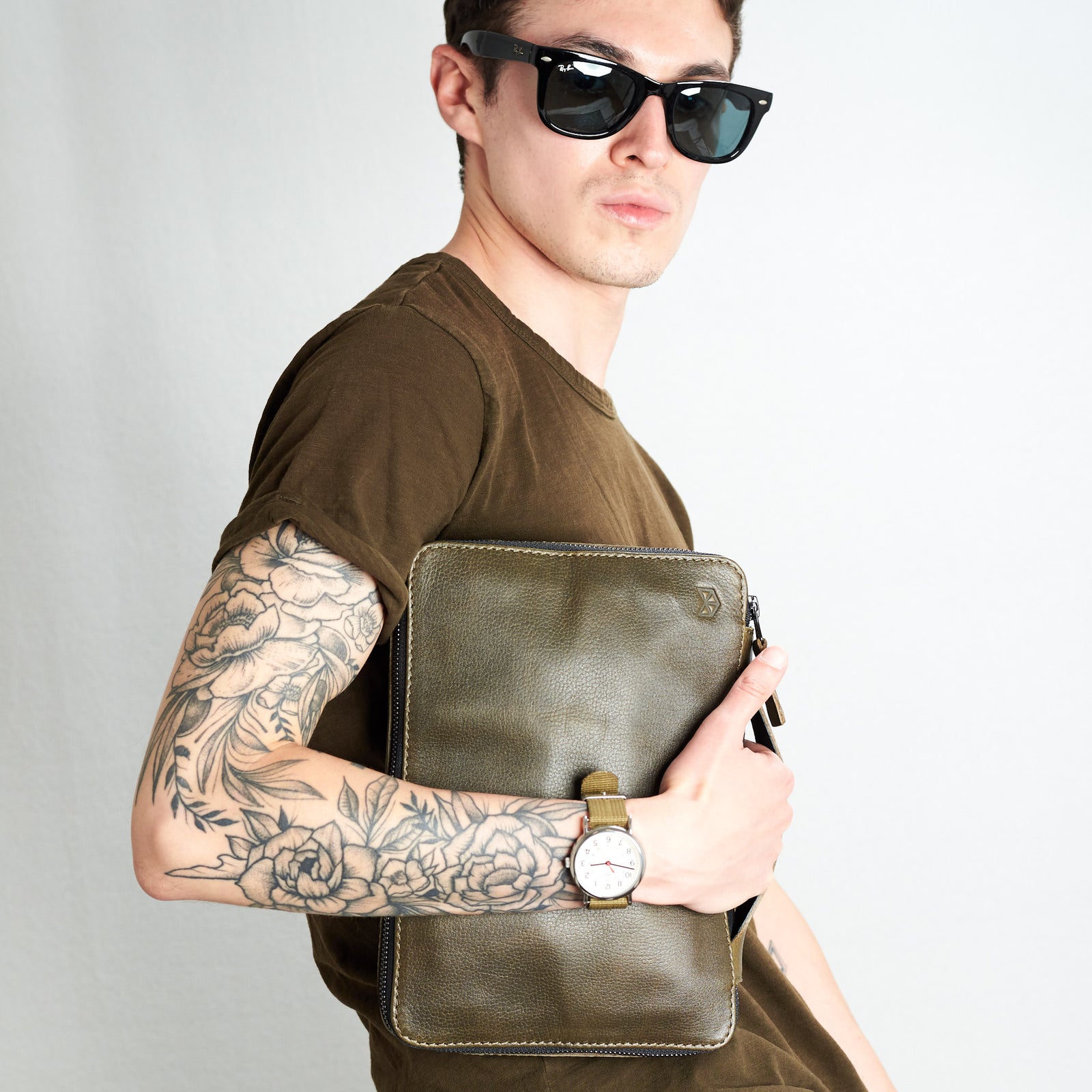 Stylish men. Green tarvel electronics organizer by Capra Leather