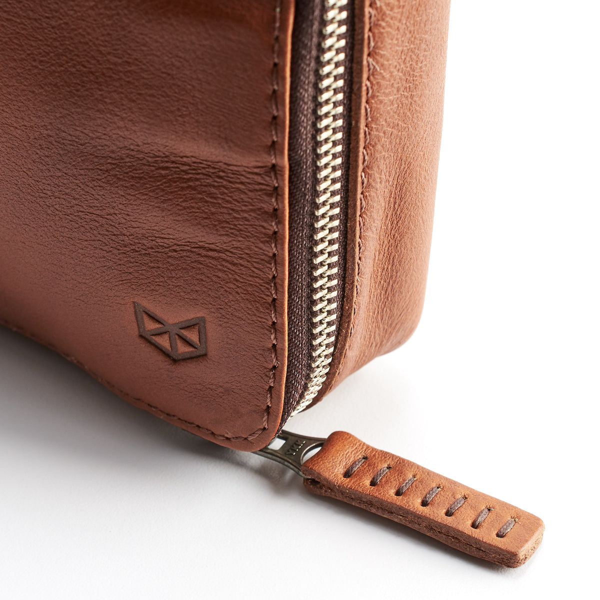 YKK metallic zippers. Tan tech accessory organizer. Leather gadget bag by Capra