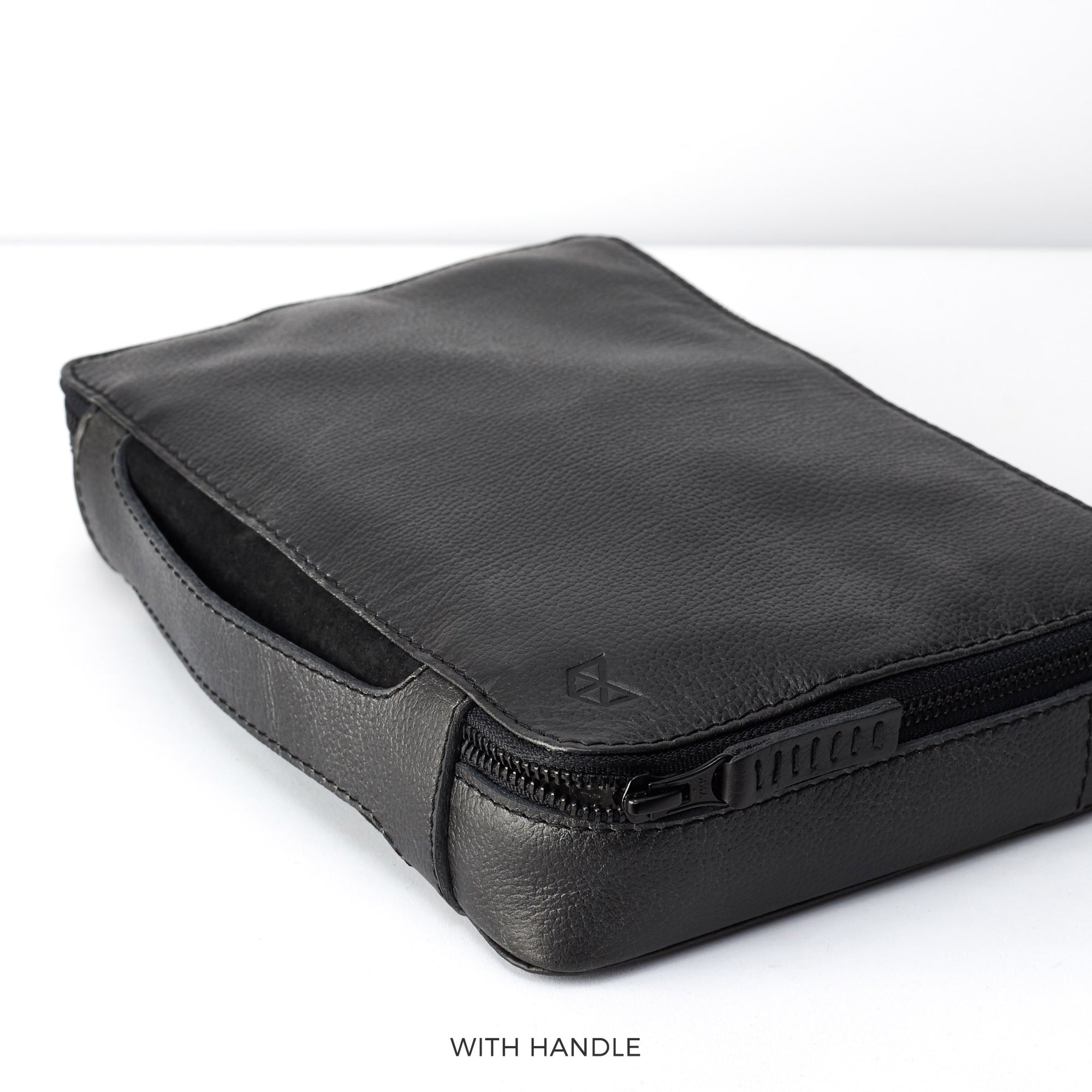 Leather handle.  Best travel tech organizer black by Capra Leather.