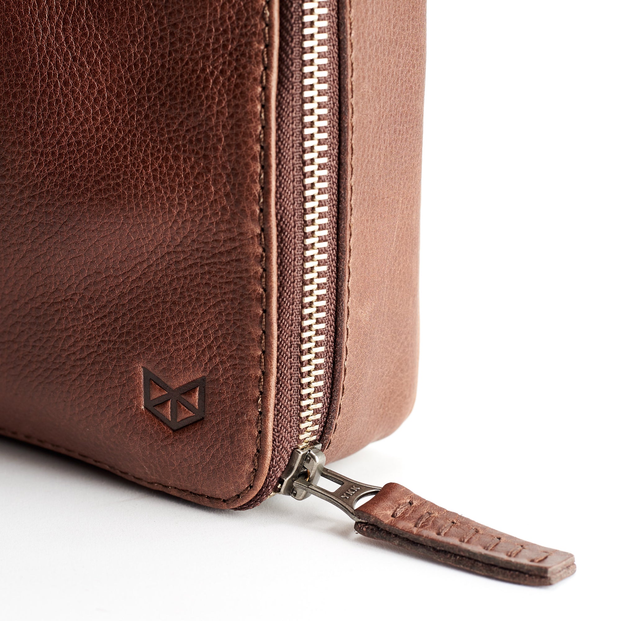 Metallic YKK zipper. Best tech travel bag brown by Capra Leather. Fits iPad Pro with Apple pencil.