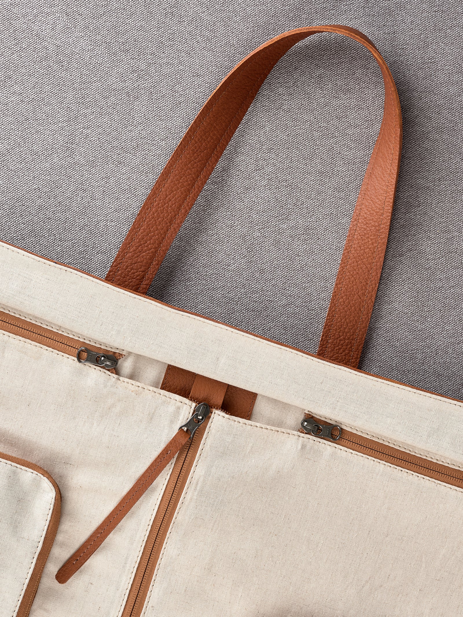 Zipper closure. Carry On Garment Bag Tan by Capra Leather