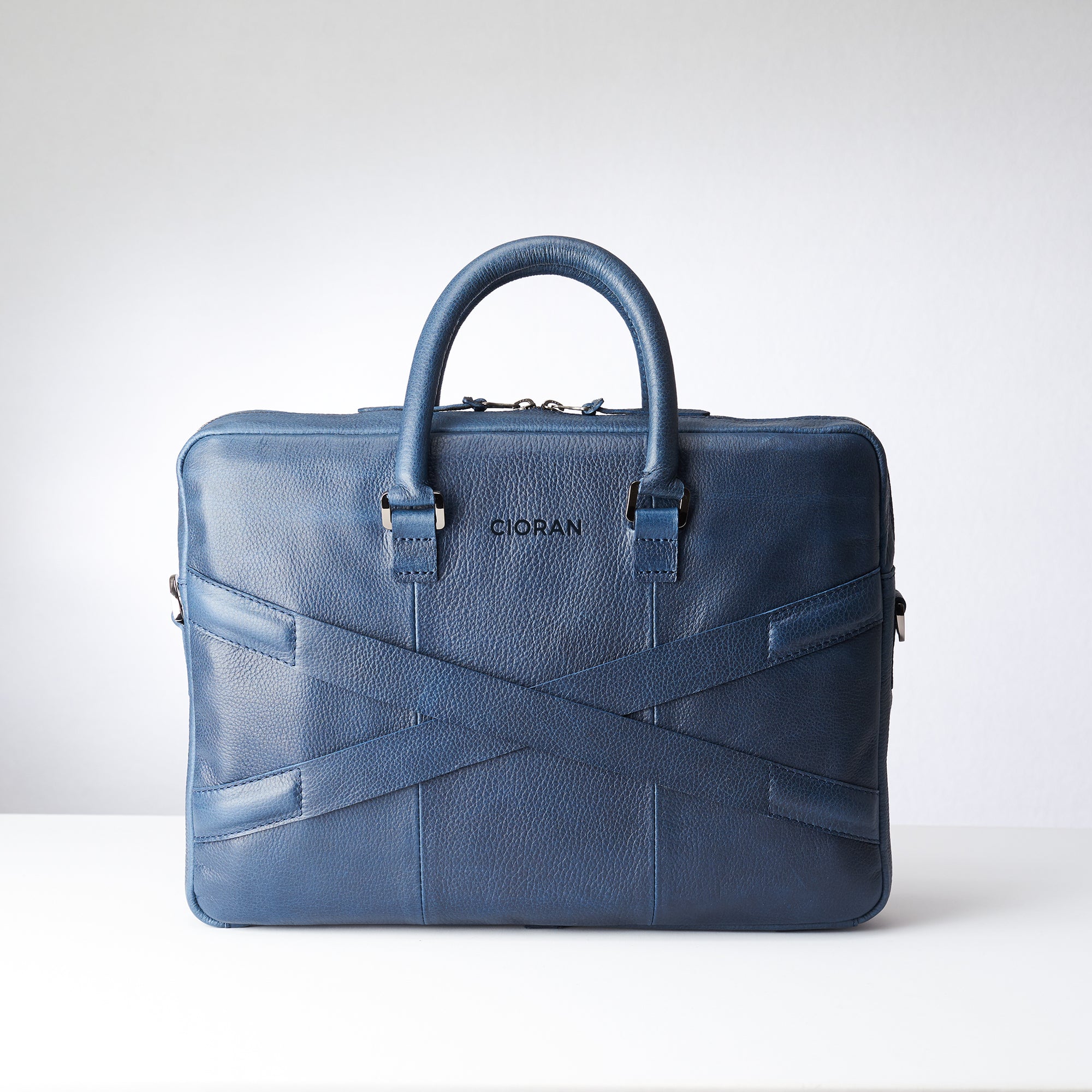 Back and luggage strap for slim portfolio .Blue leather briefcase laptop bag for men. Gazeli laptop briefcase by Capra Leather.