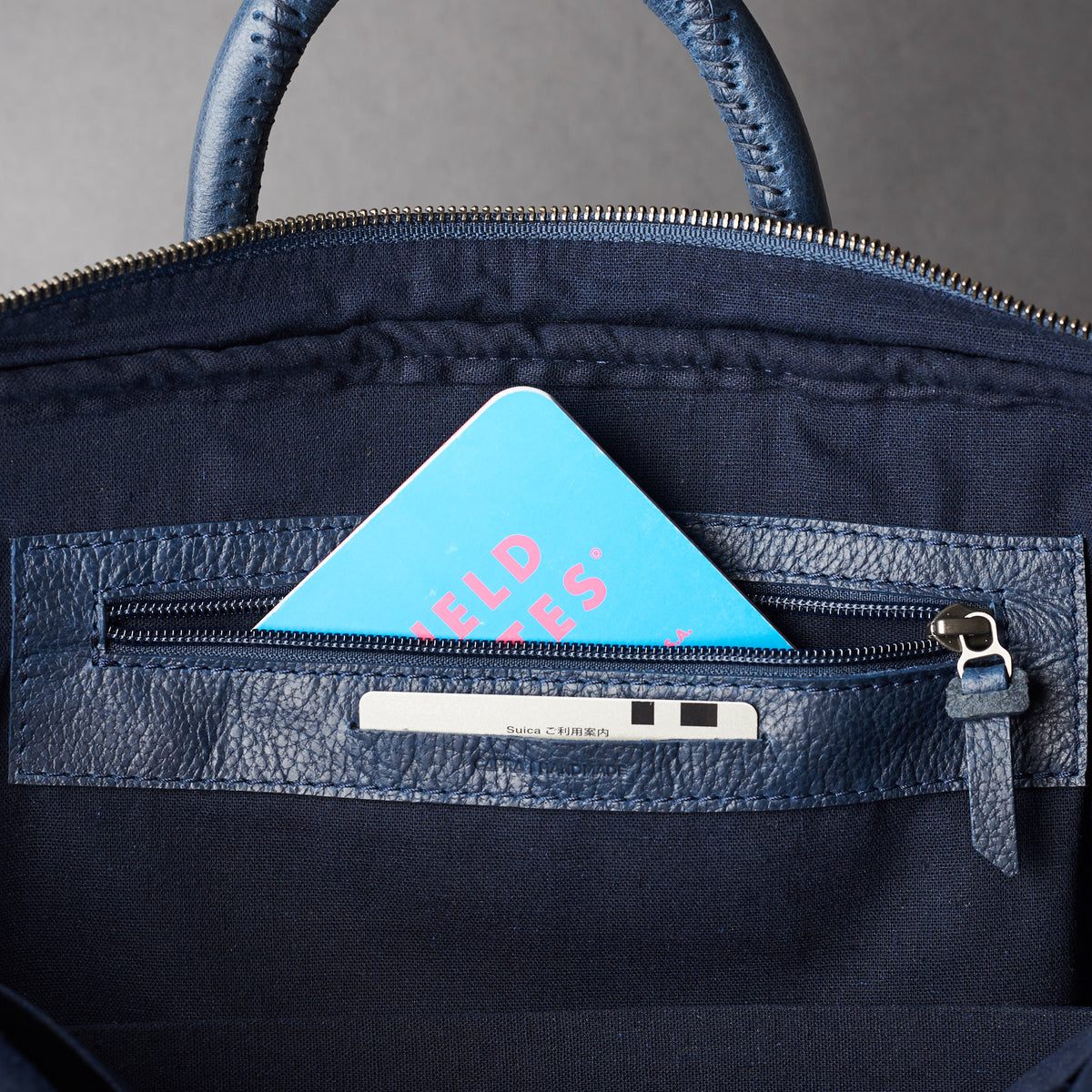 Interior detail for bussiness cards .Blue leather briefcase laptop bag for men. Gazeli laptop briefcase by Capra Leather.