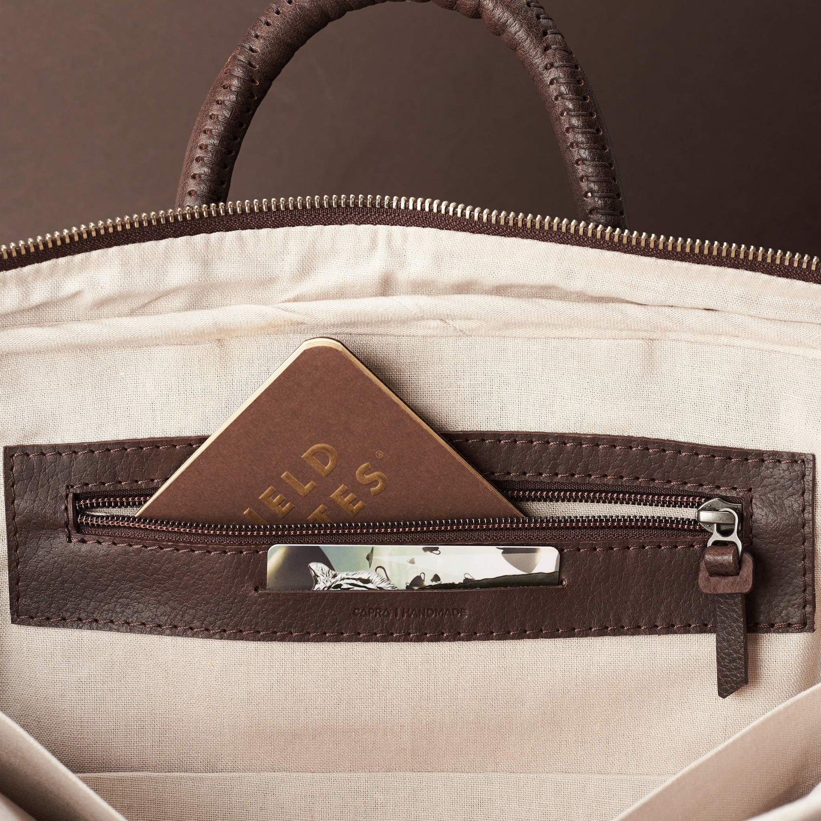 Interior detail for bussiness cards .Dark Brown leather briefcase laptop bag for men. Gazeli laptop briefcase by Capra Leather.