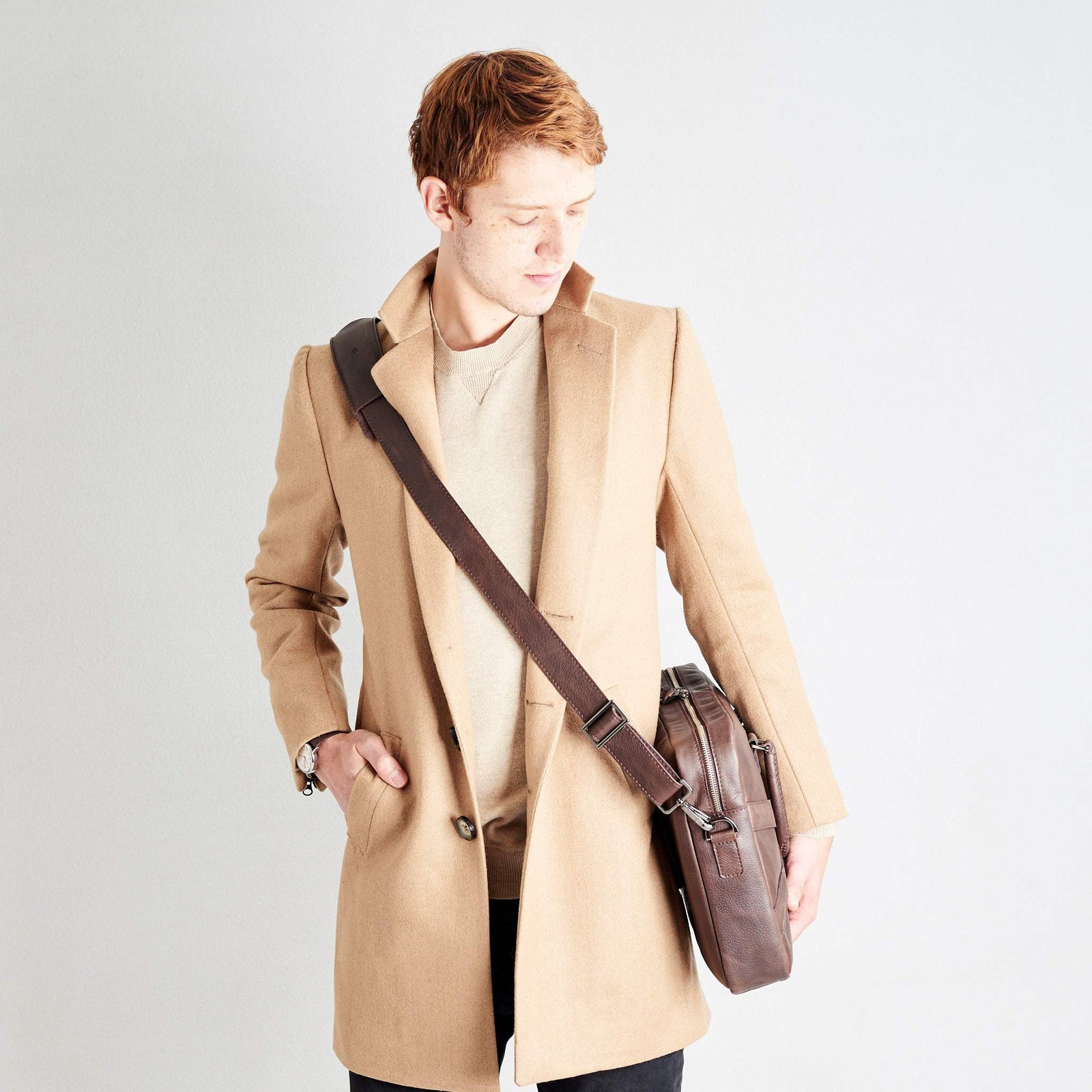 Shoulder bag in use side view of workbag. Dark Brown leather briefcase laptop bag for men. Gazeli laptop briefcase by Capra Leather.