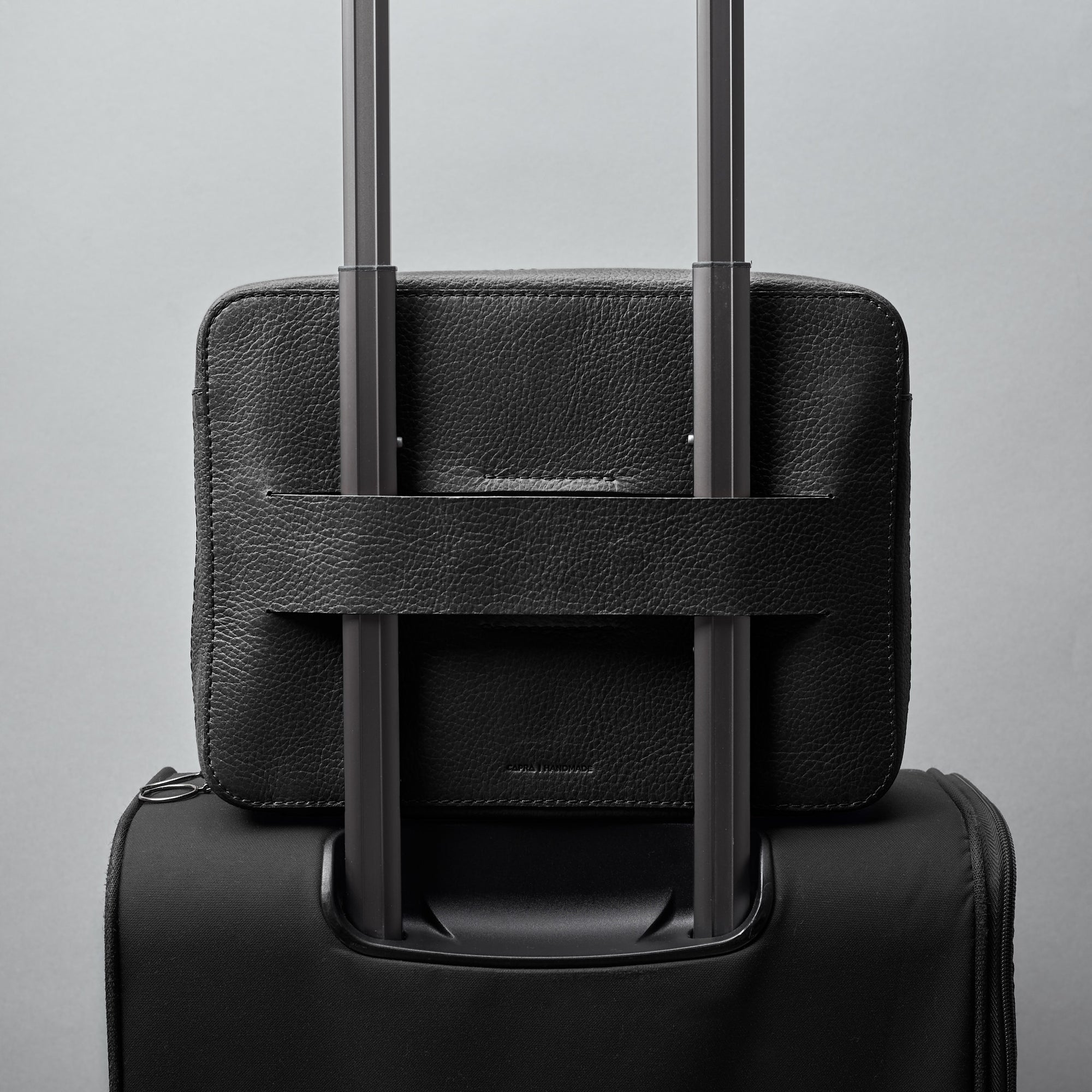 Discreet luggage strap. Black tech accessory organizer by Capra Leather