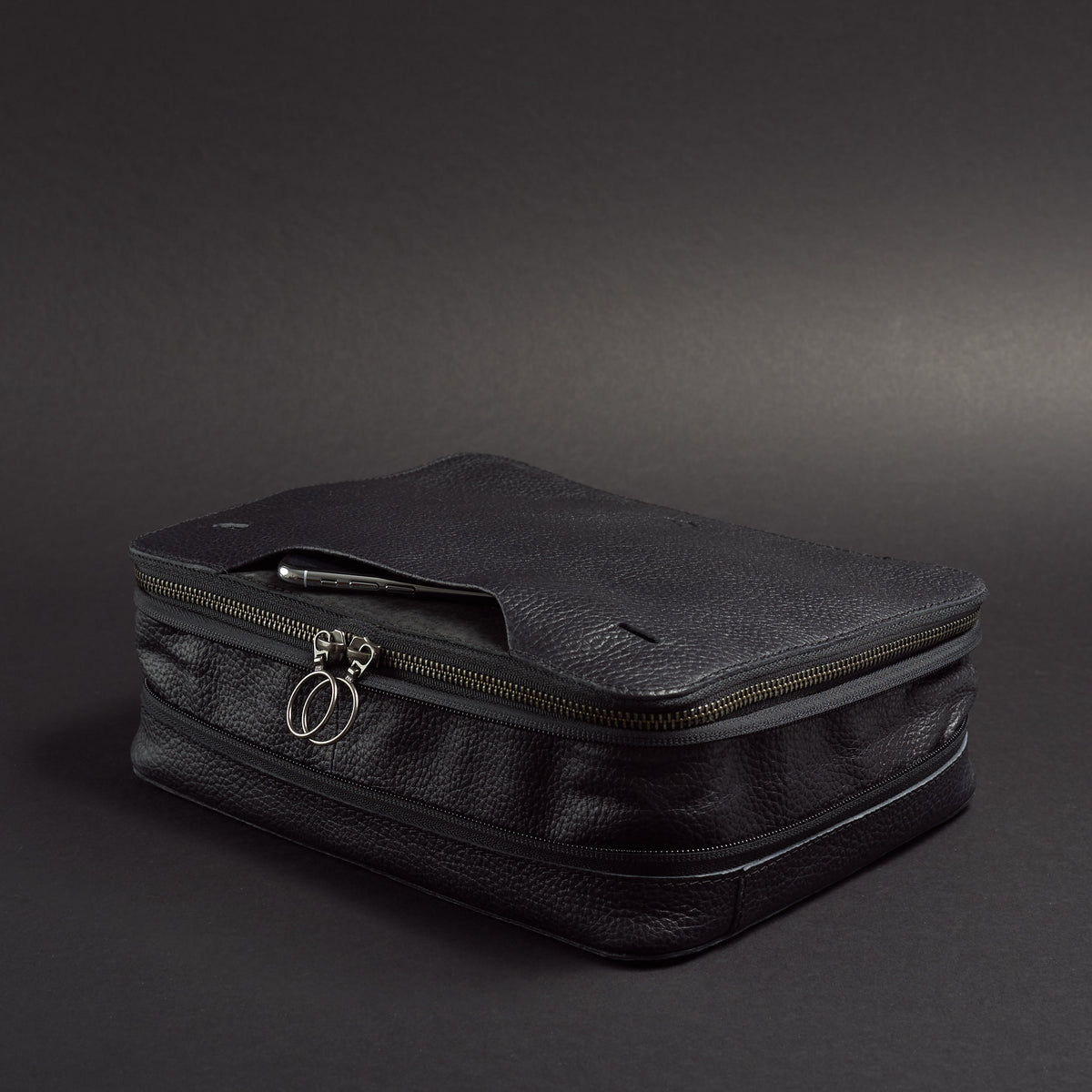 Expansion & Compression System. Black EDC laptop bag by Capra Leather