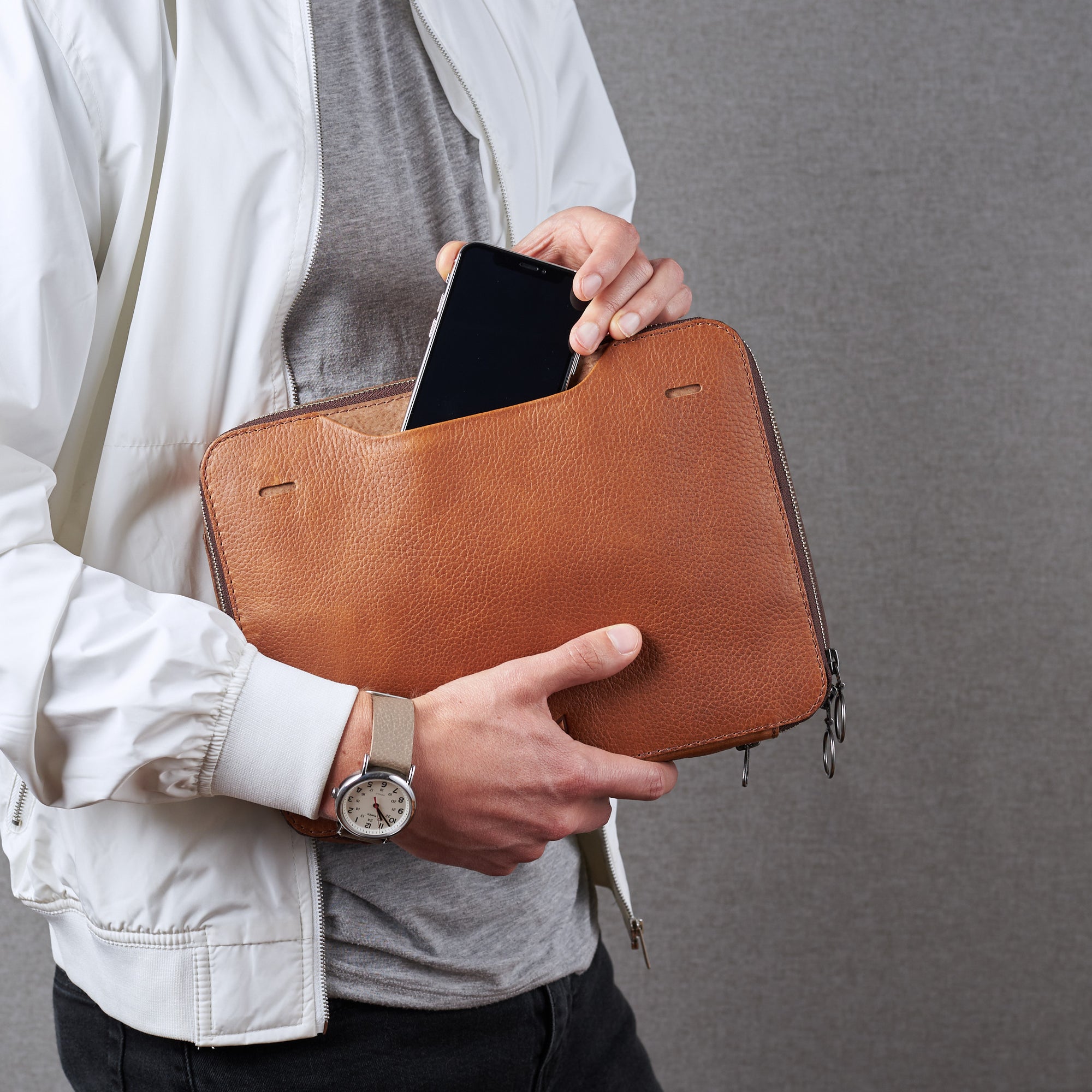 Quick access pocket. Tan small gadget bag by Capra Leather
