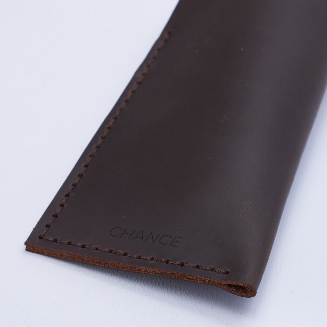 Handmade marron glasses case engraved with initials