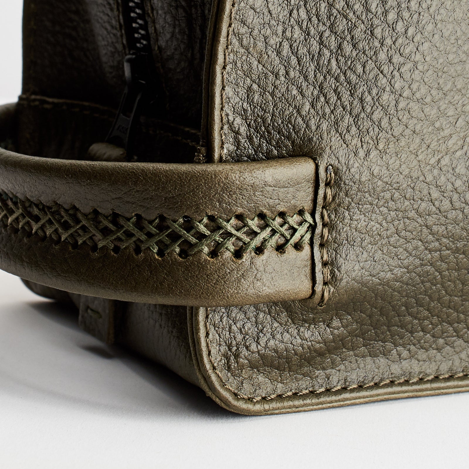 Pull up effect. Green leather toiletry, shaving bag with hand stitched handle. Groomsmen gifts