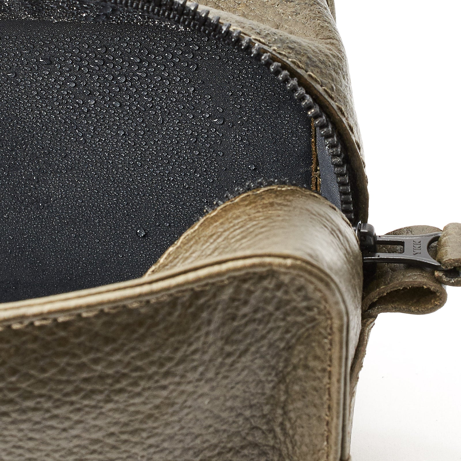 Waterproof interior. Green leather toiletry, shaving bag with hand stitched handle. Groomsmen gifts