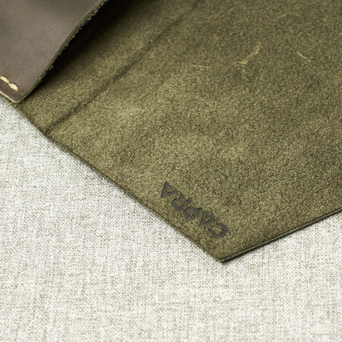 Leather soft interior. Green Google Pixelbook leather sleeve with Google pen holder.