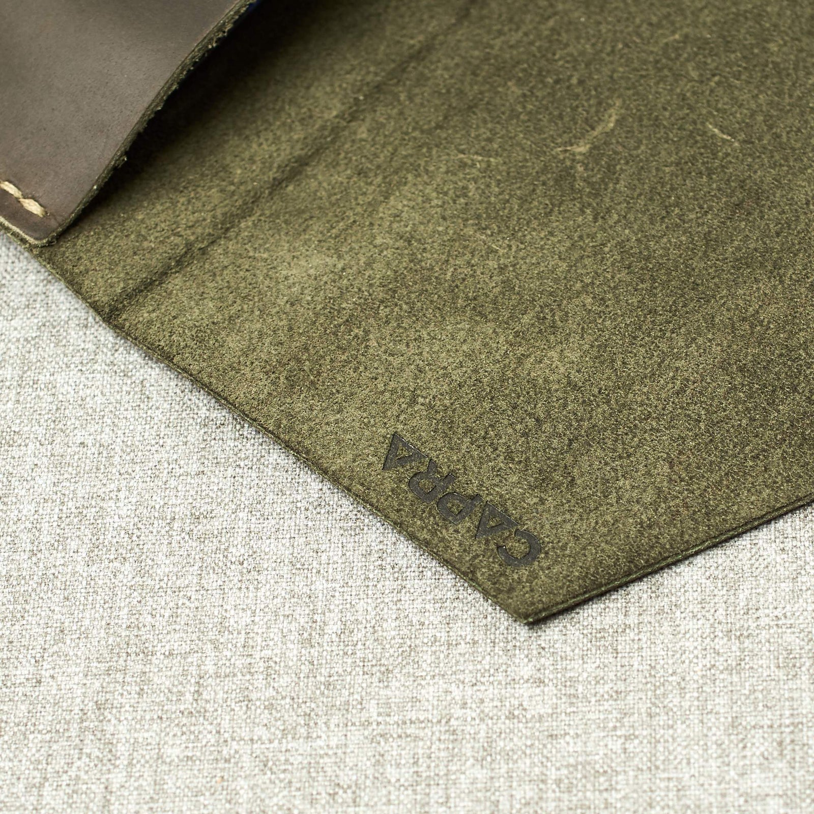 Leather soft interior. Green Google Pixelbook leather sleeve with Google pen holder.