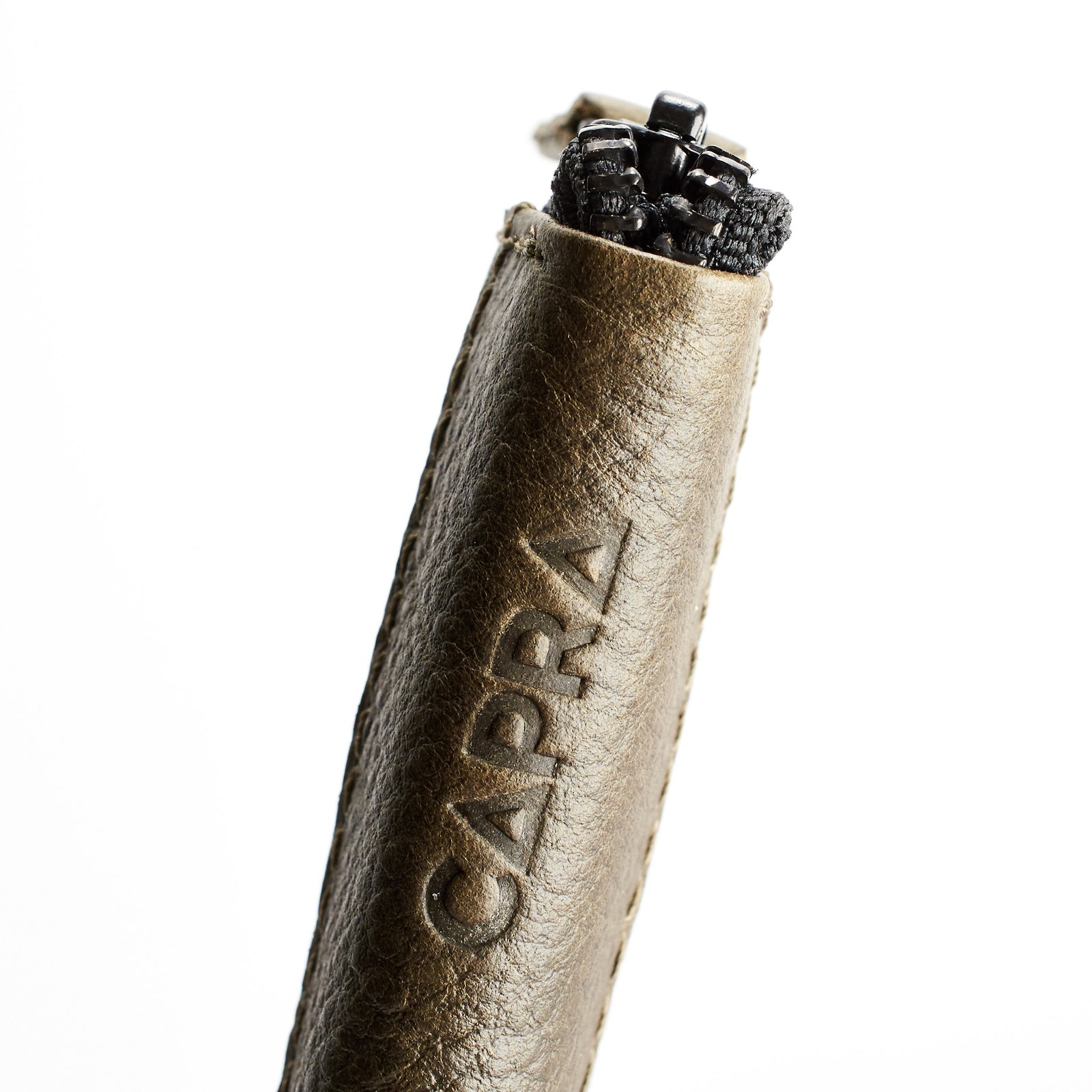 Close up. Green Passport Holder for travelers, document organizer, travel journal by Capra Leather