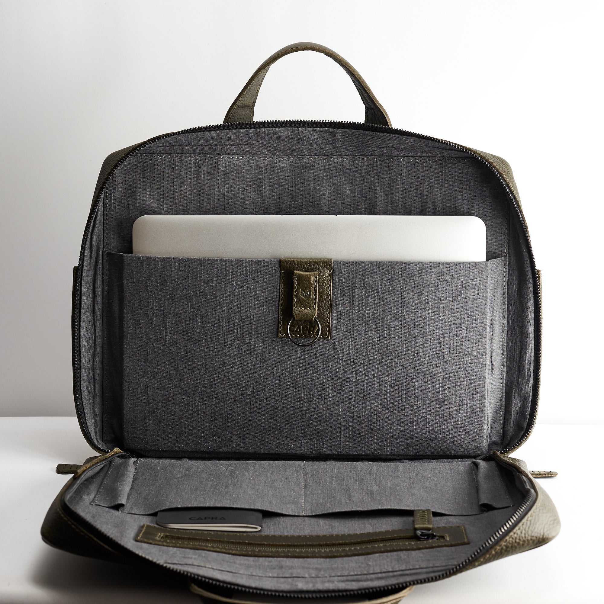 Interior pocket detail. Green leather briefcase for men. Linen interior. Workbag for Macbook Pro 13inch 15inch