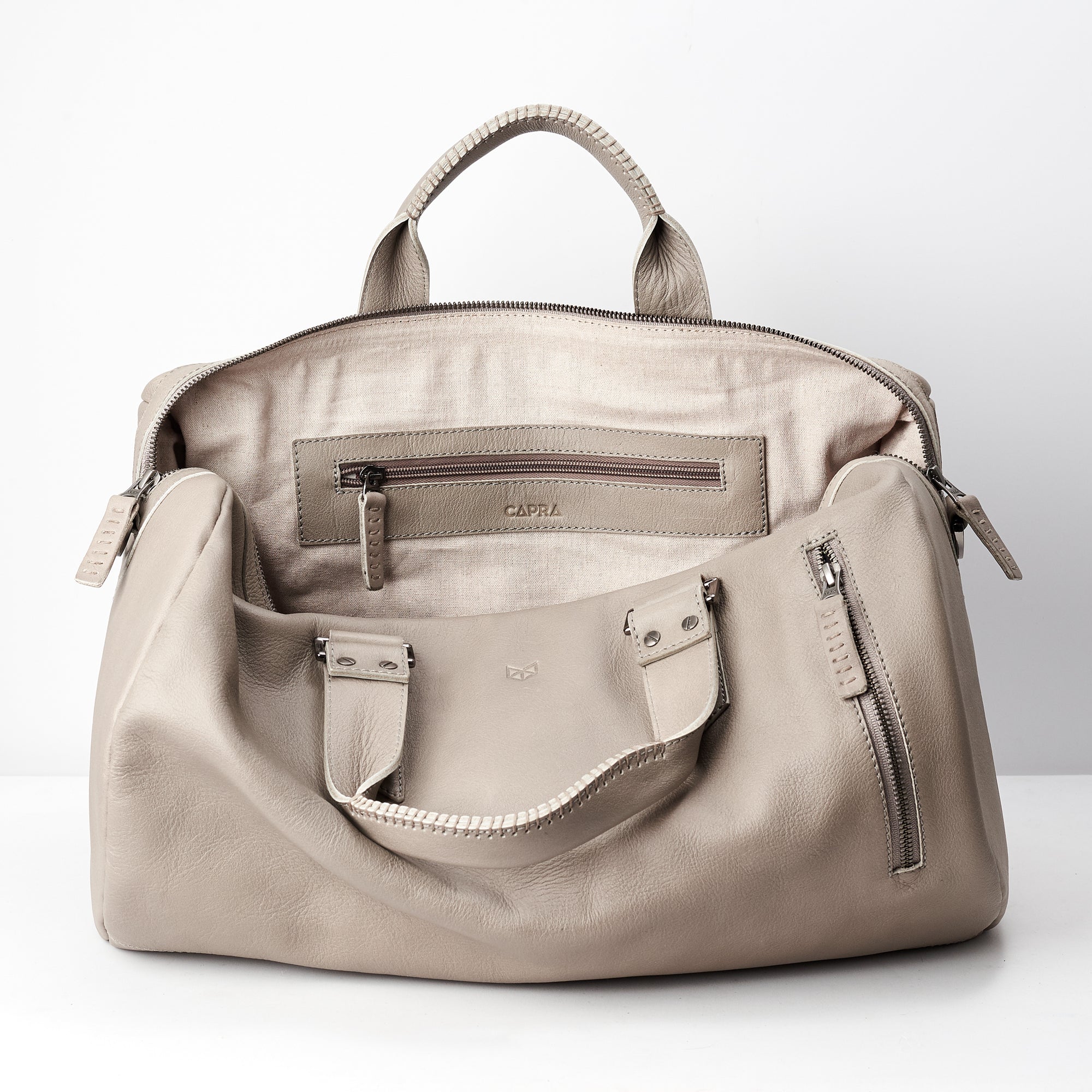 Linen interior. handcrafted Grey leather duffle bag for men. Grey leather carryall bag. 