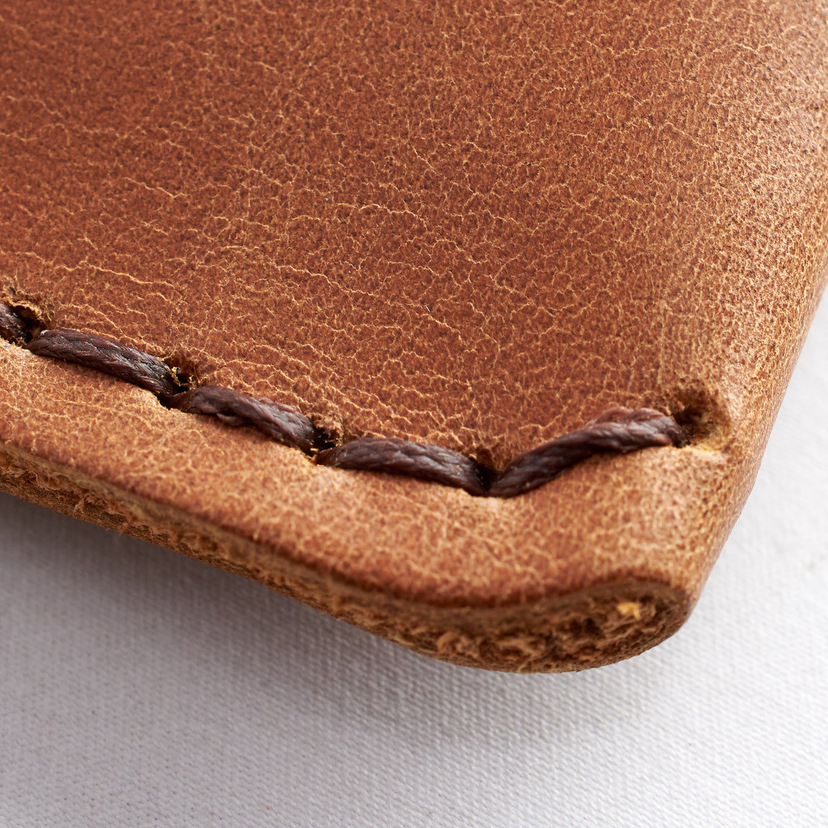 Hand stitch detail. Google Pixel Slate Tan by Capra Leather