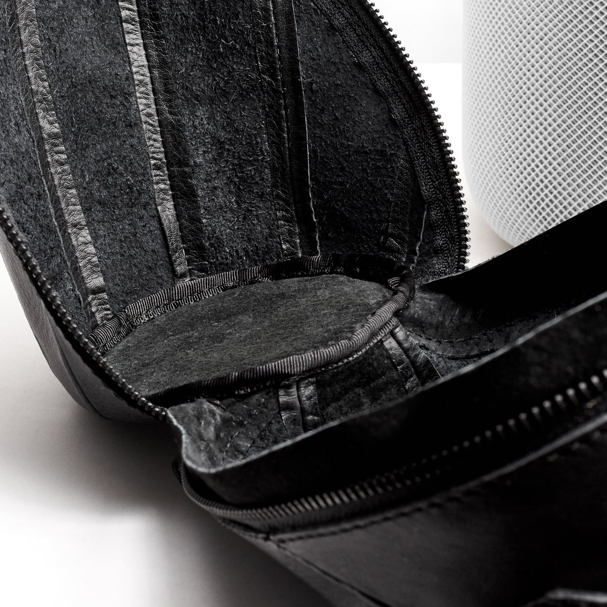 Soft leather interior and Padded Bottom. HomePod black leather travel carrying case.