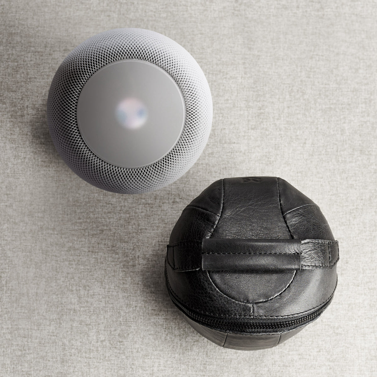 Top handle. HomePod black leather travel carrying case.
