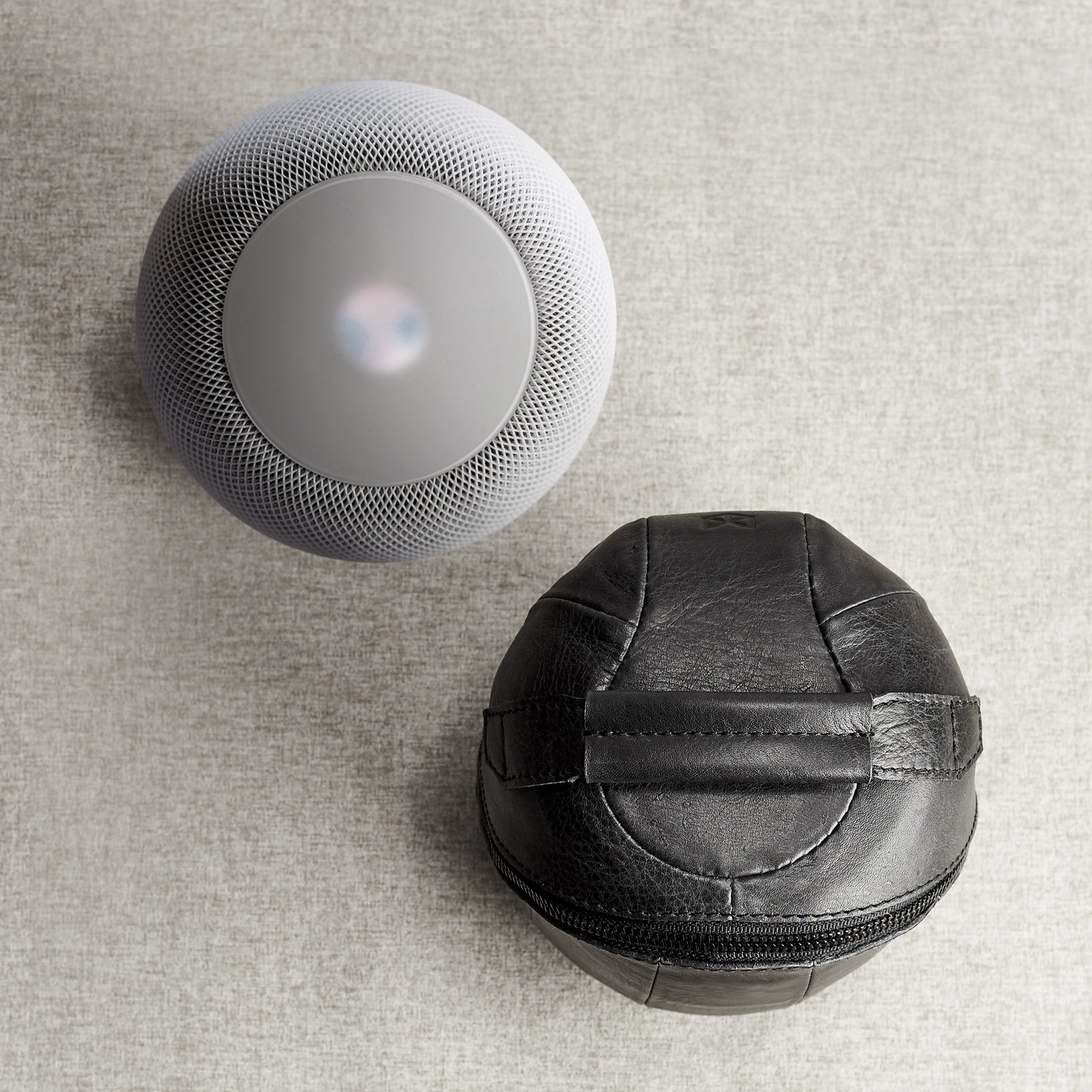 Top handle. HomePod black leather travel carrying case.