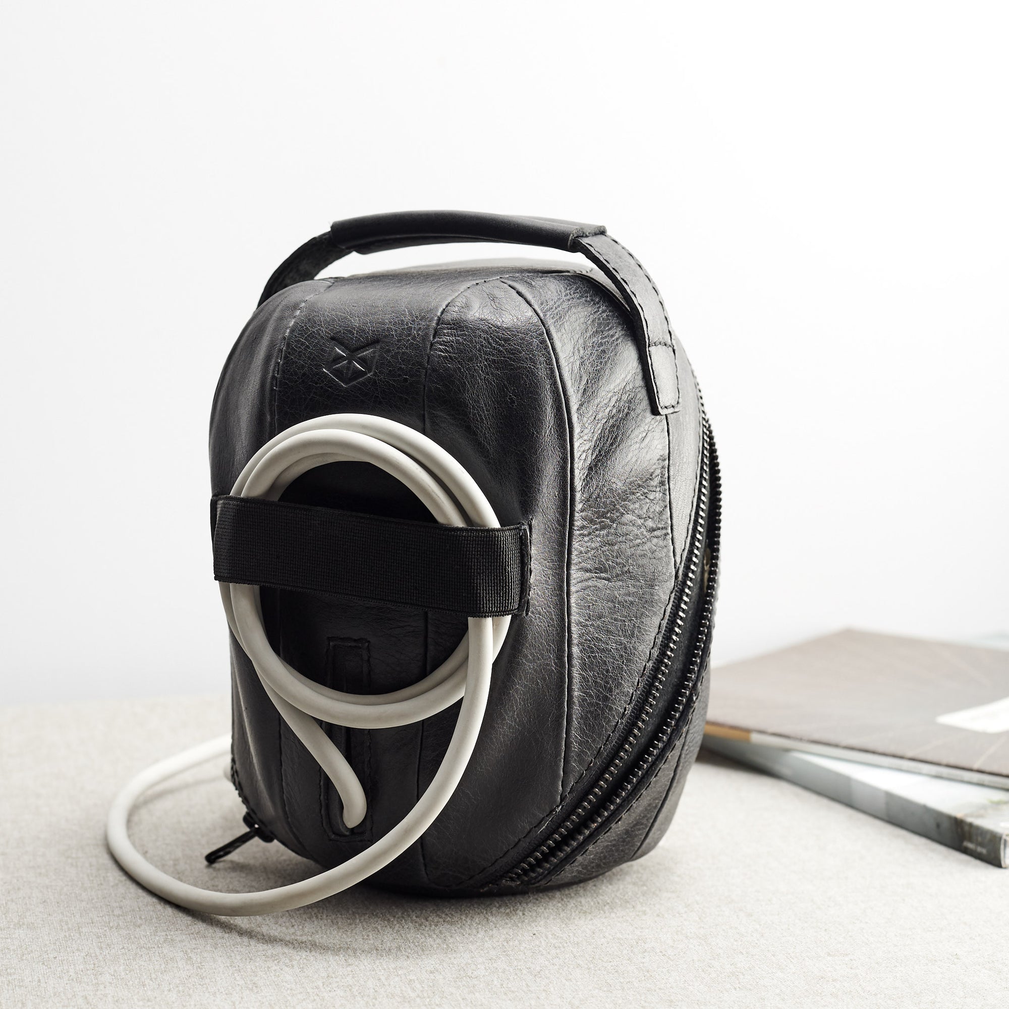 Black elastic band to hold the smart speaker cable. HomePod black leather travel carrying case.