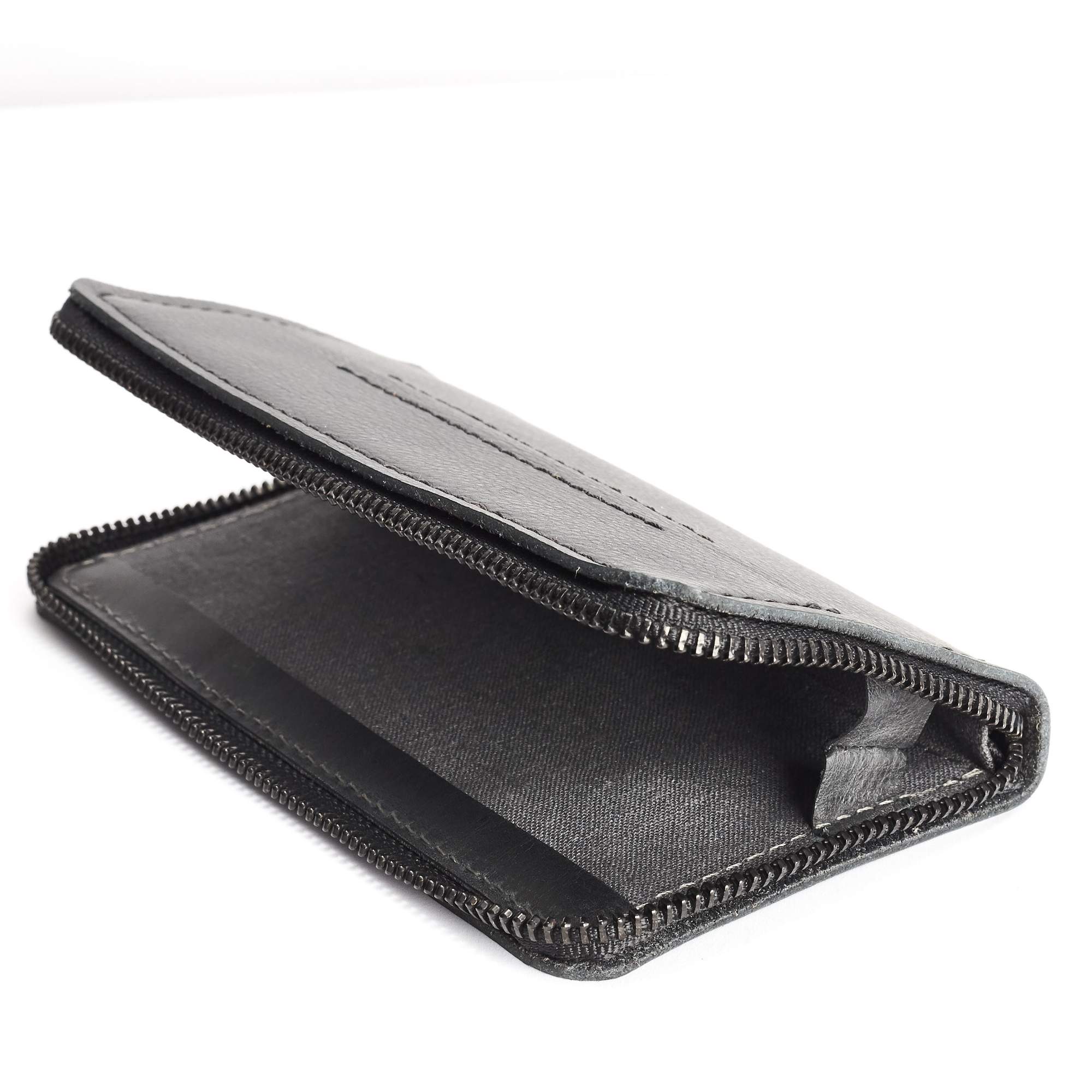Linen interior. Black handcrafted leather stand case for the Samsung Galaxy S8 and S8 Plus. Samsung sleeve wallet with card holder