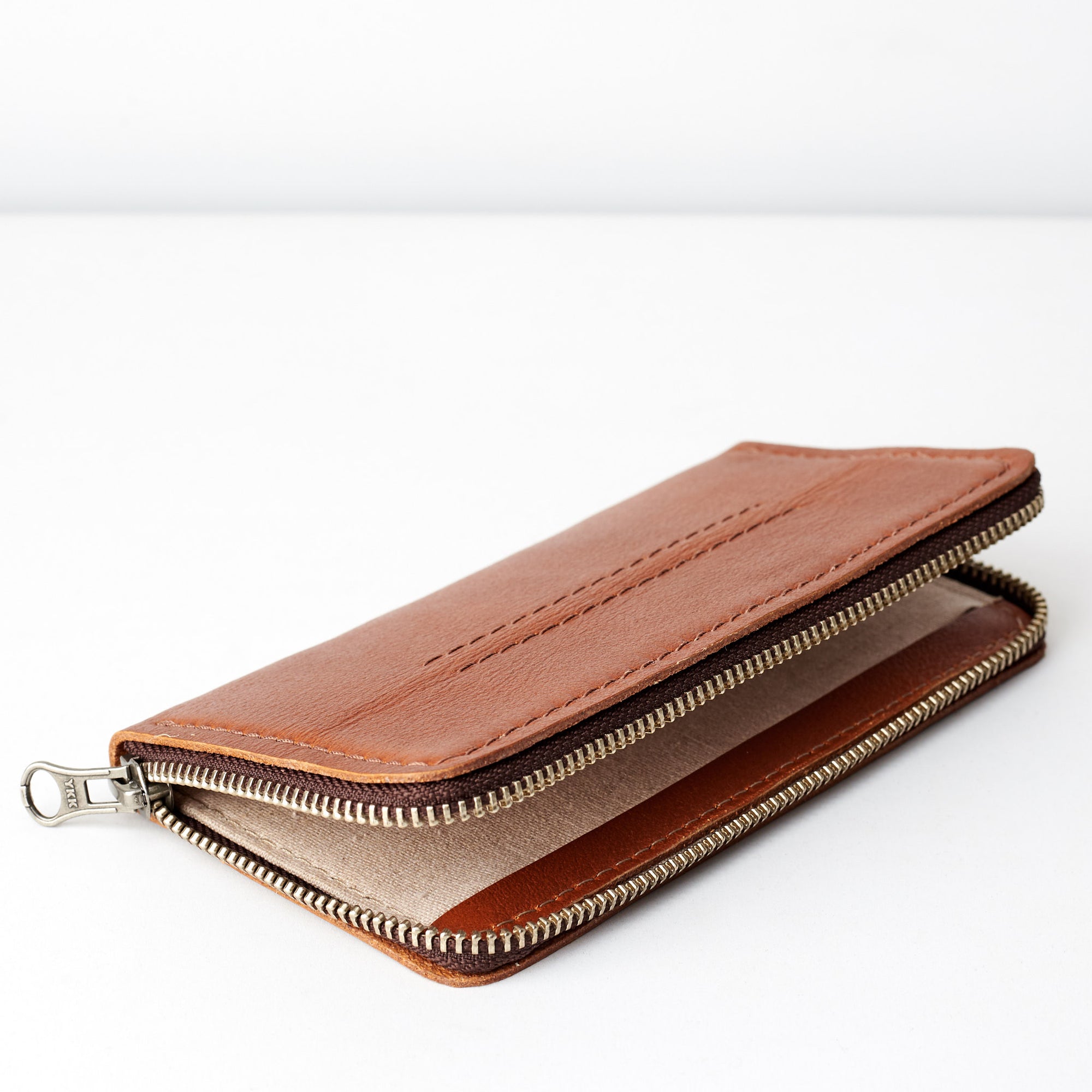 Linen interior. Carefully handcrafted brown leather case stand wallet for new Google Pixel 2 and 2 XL. Men's Pixel sleeve with card holder. Crafted by Capra Leather.