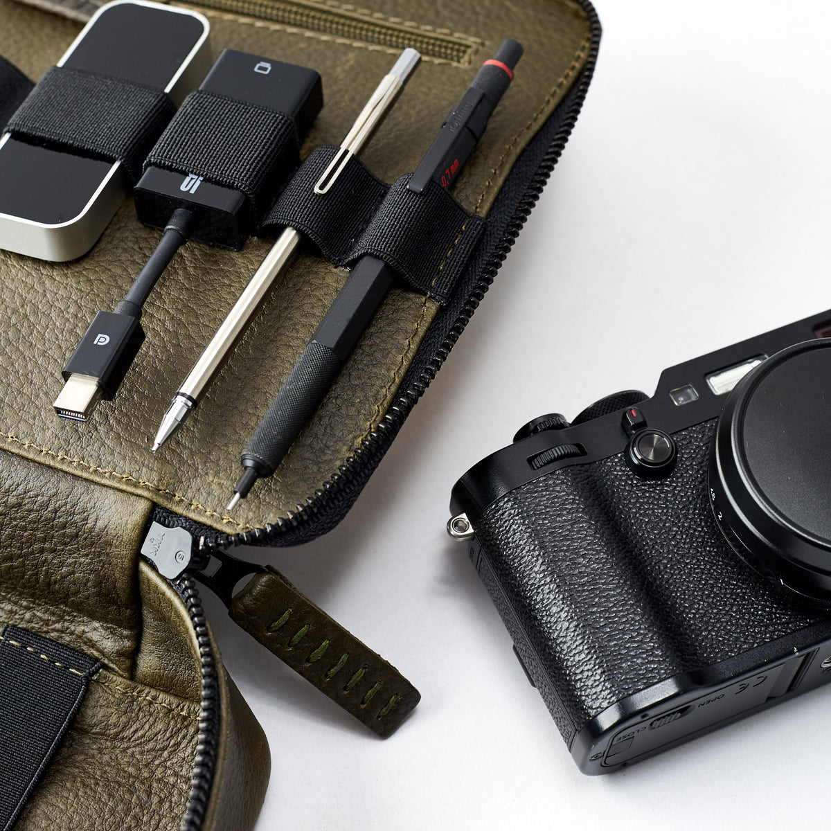 Green tech organizer travel. Tech gear bag by Capra Leather