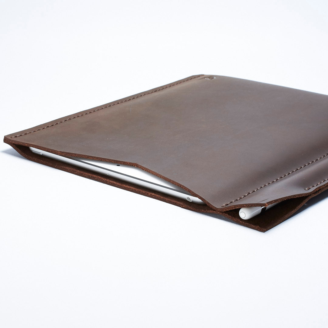 Side from the slim iPad pro sleeve. Dark brown iPad pro leather sleeve with apple pencil holder 