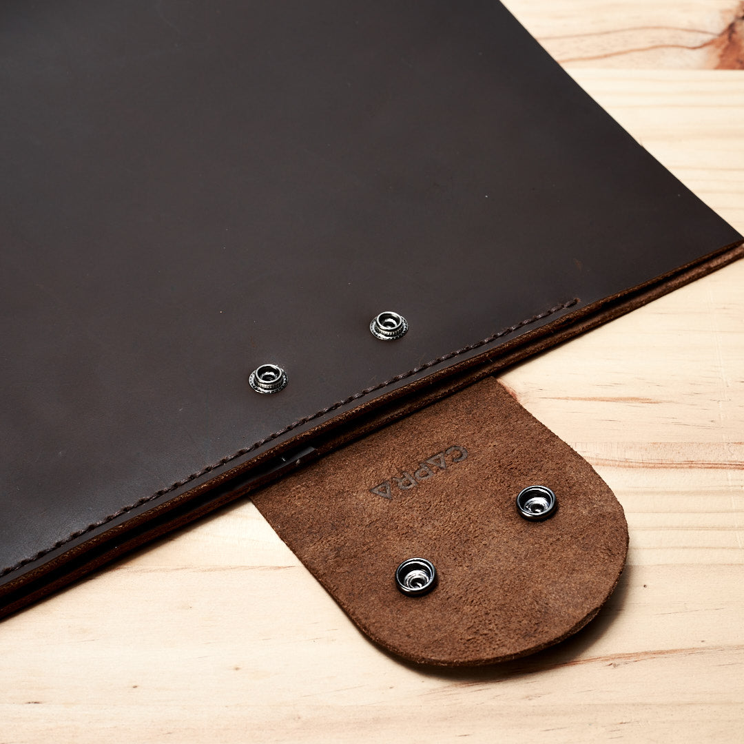 Closure. Handmade leather portfolio. Mens unique hand stitched document portfolio 