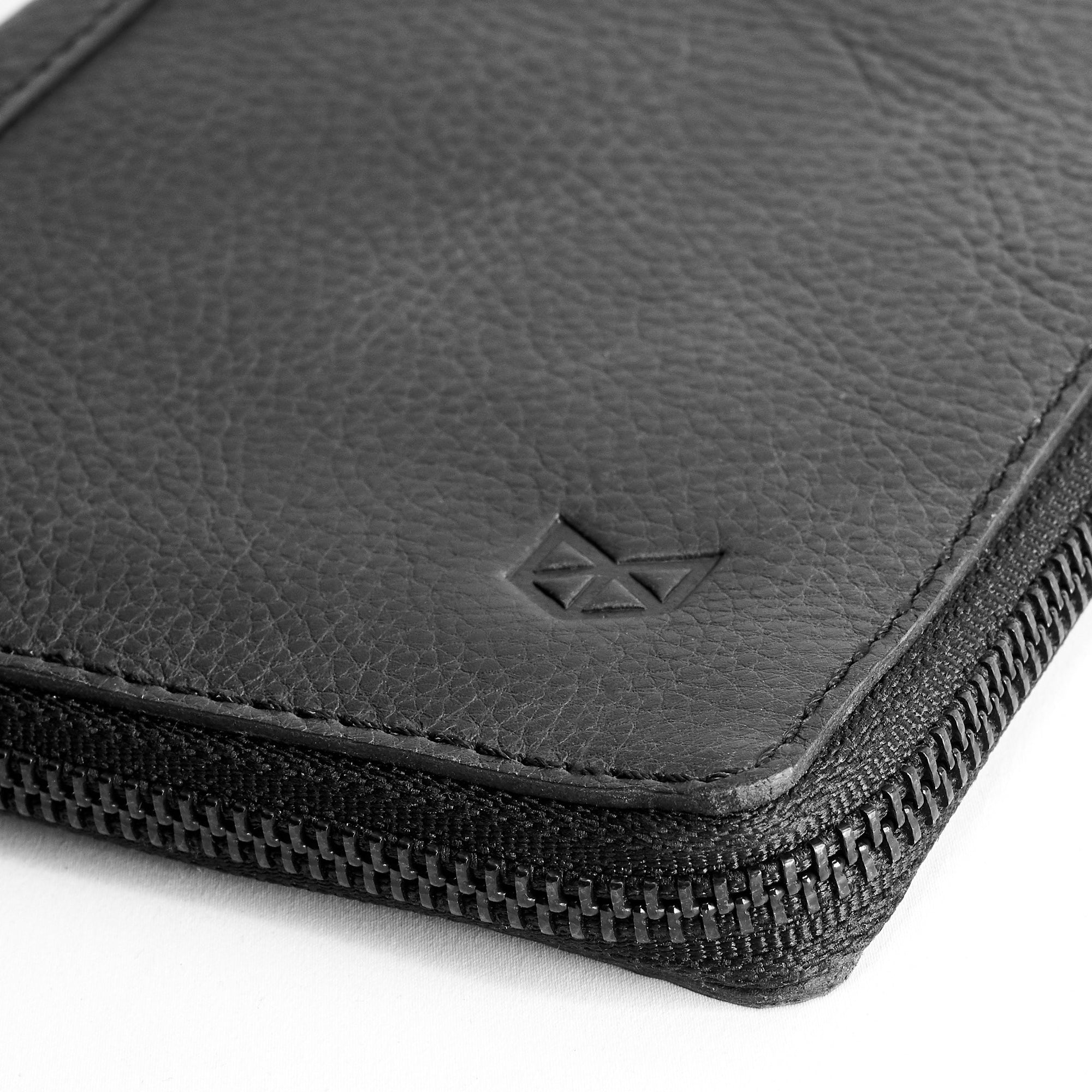 Full grain leather detail. Black Passport Holder for travelers, document organizer, travel journal by Capra Leather