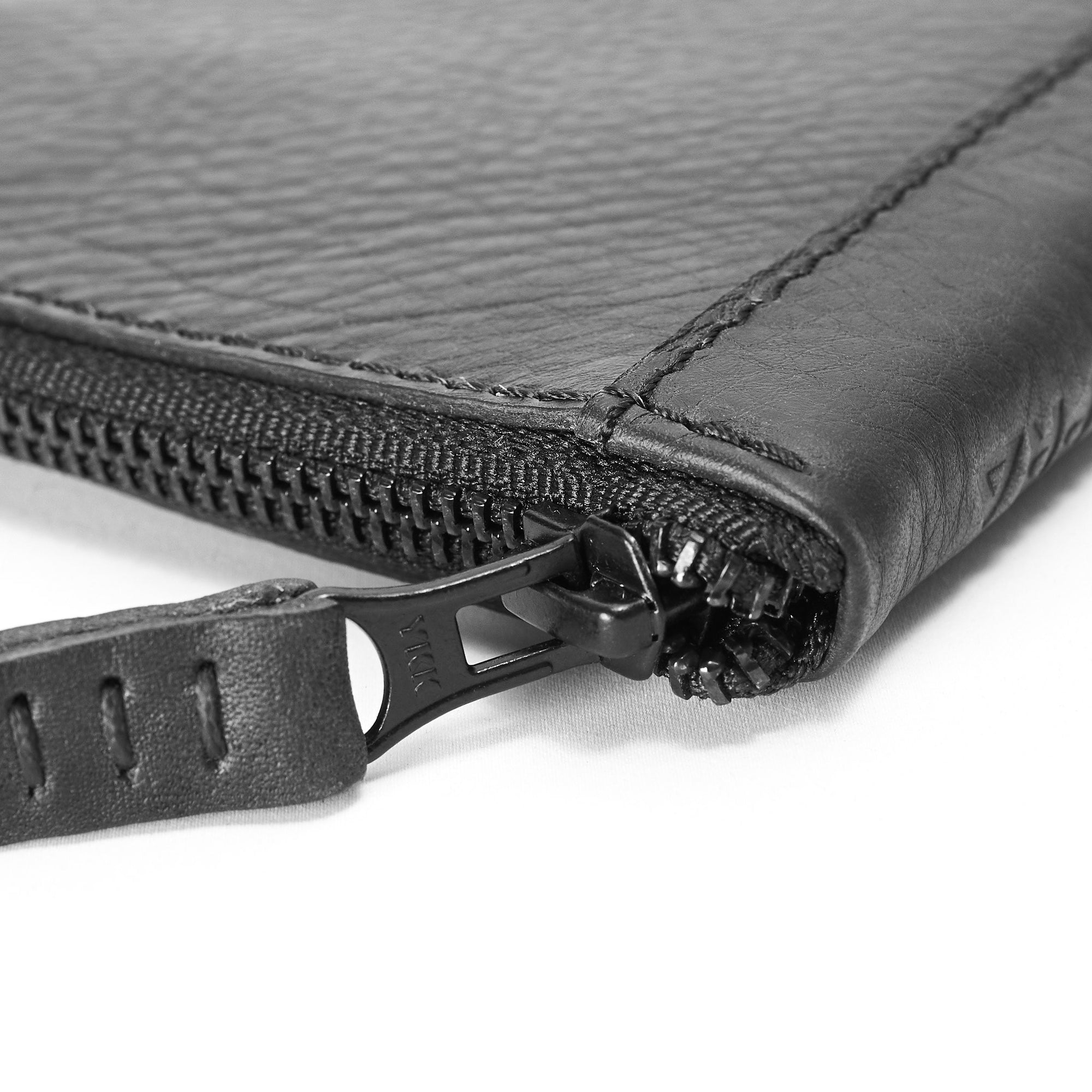 YKK zipper detail. Black Passport Holder for travelers, document organizer, travel journal by Capra Leather