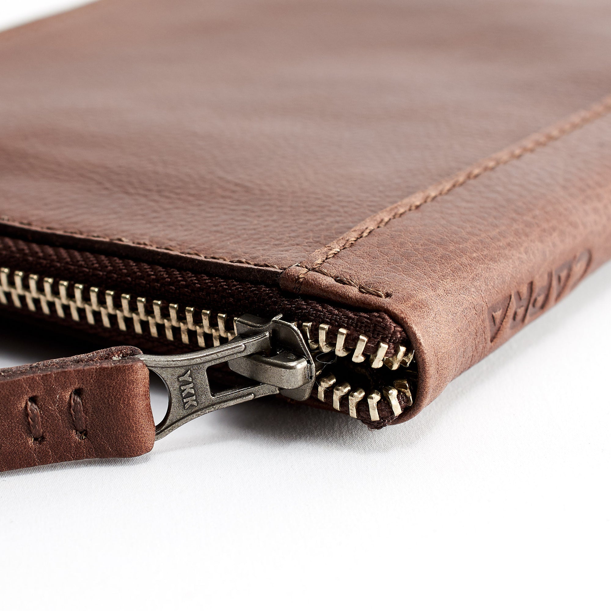YKK zipper detail. Brown Passport Holder for travelers, document organizer, travel journal by Capra Leather