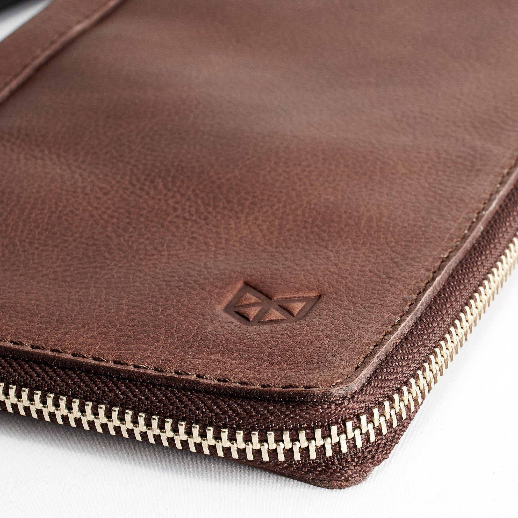 Close up. Brown Passport Holder for travelers, document organizer, travel journal by Capra Leather