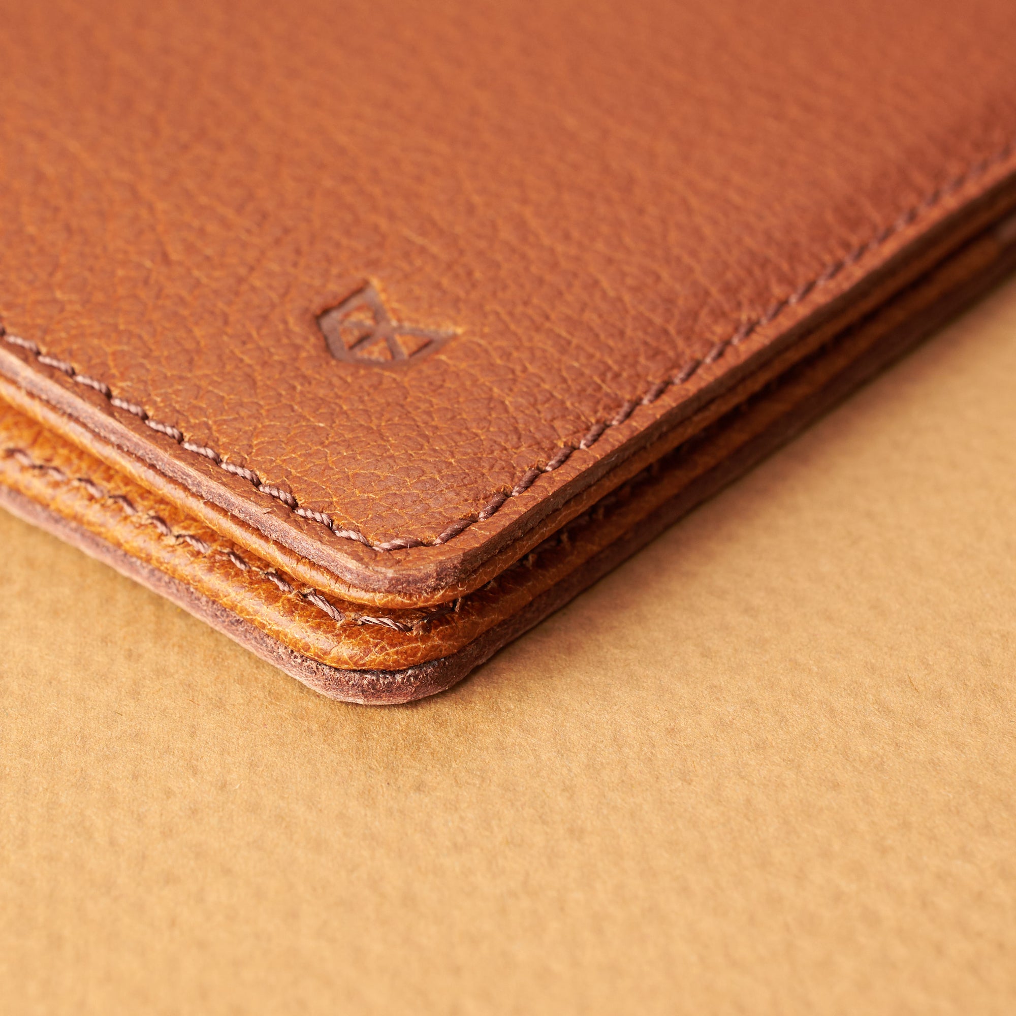 Stitching detail. Pocket Passport Holder Travel Wallet Tan by Capra Leather