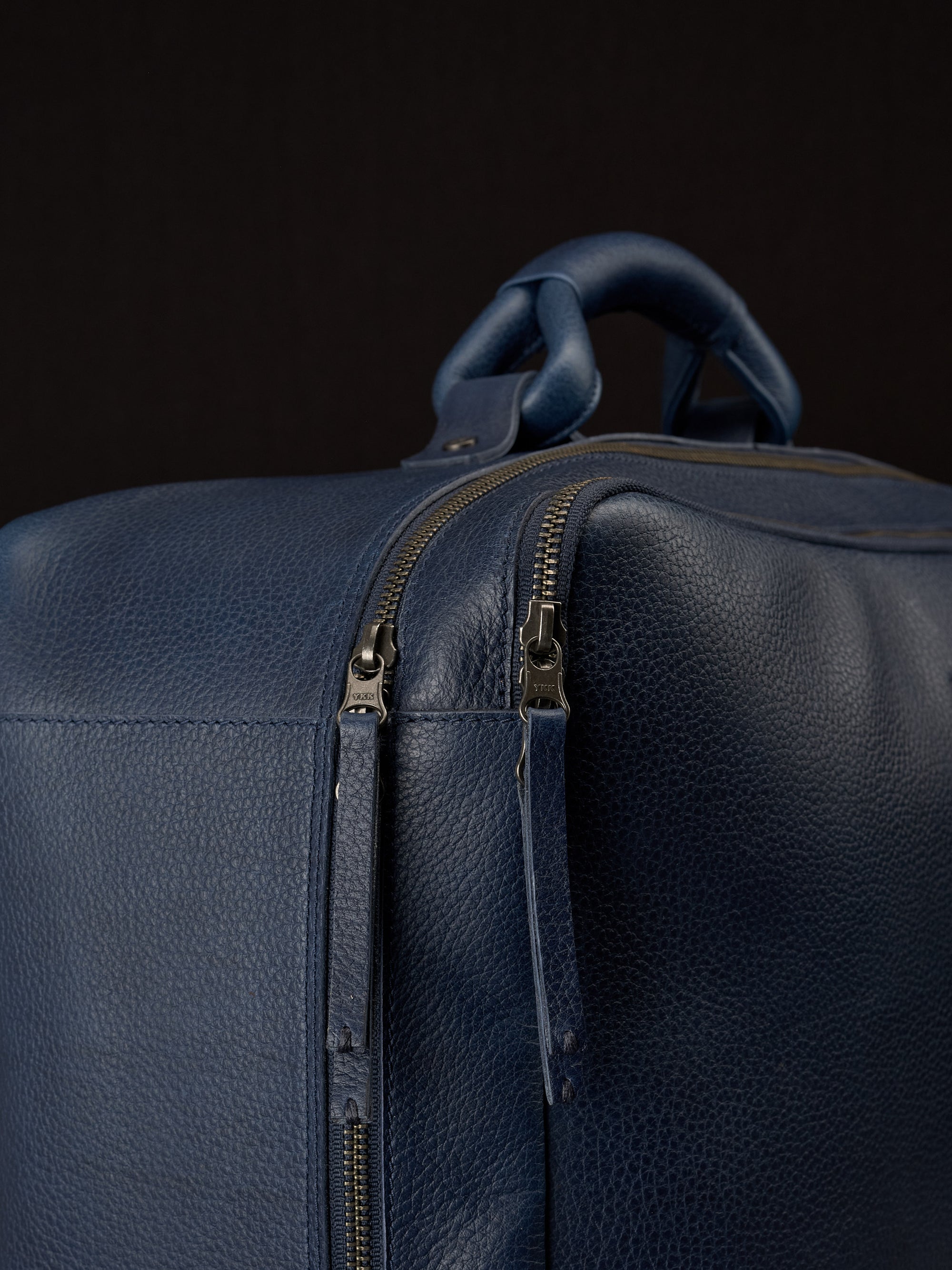 Hand stitched pull tabs designer duffle bag navy by Capa Leather