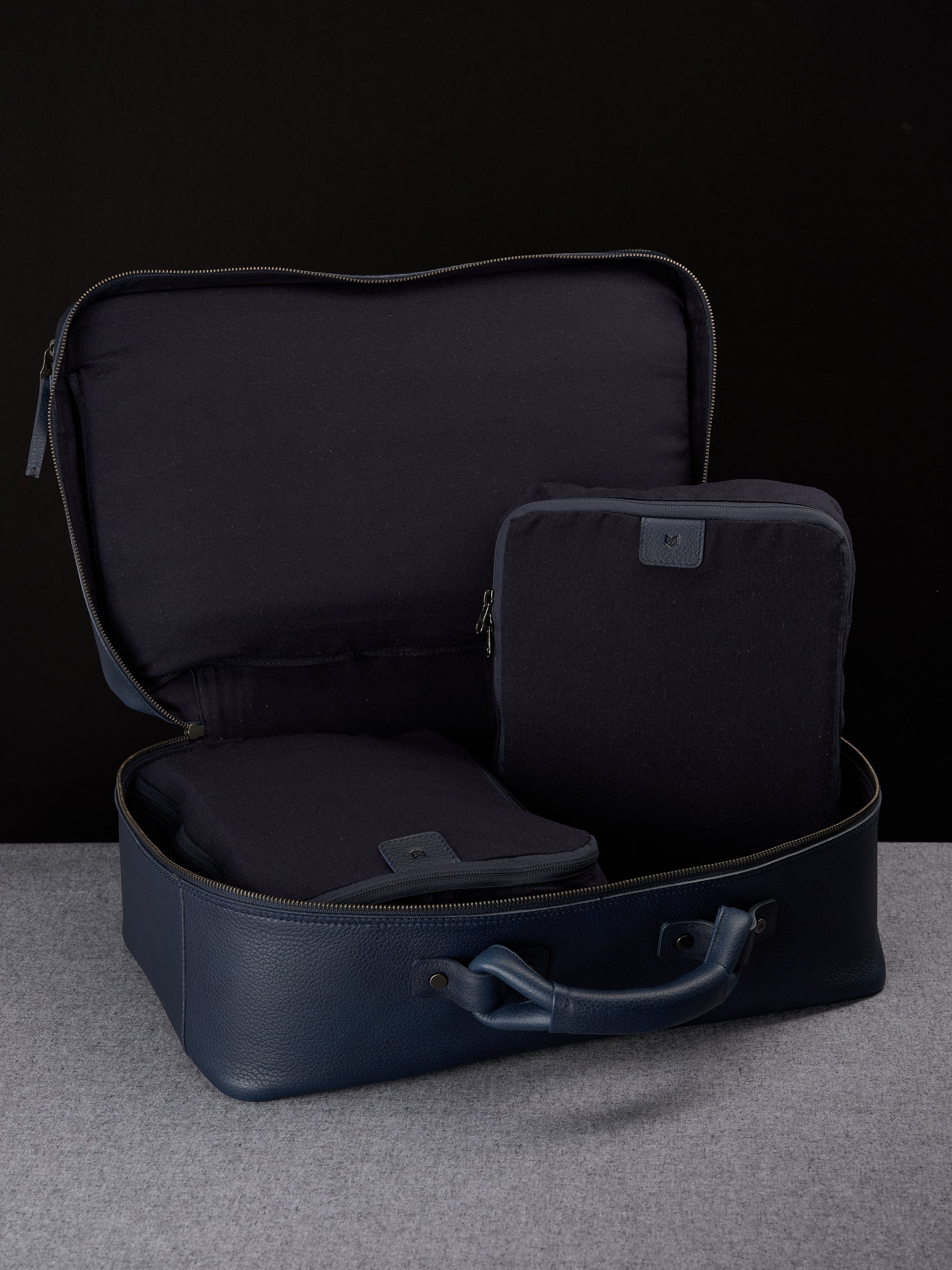 Leather duffle bag navy with shoulder strap by Capra
