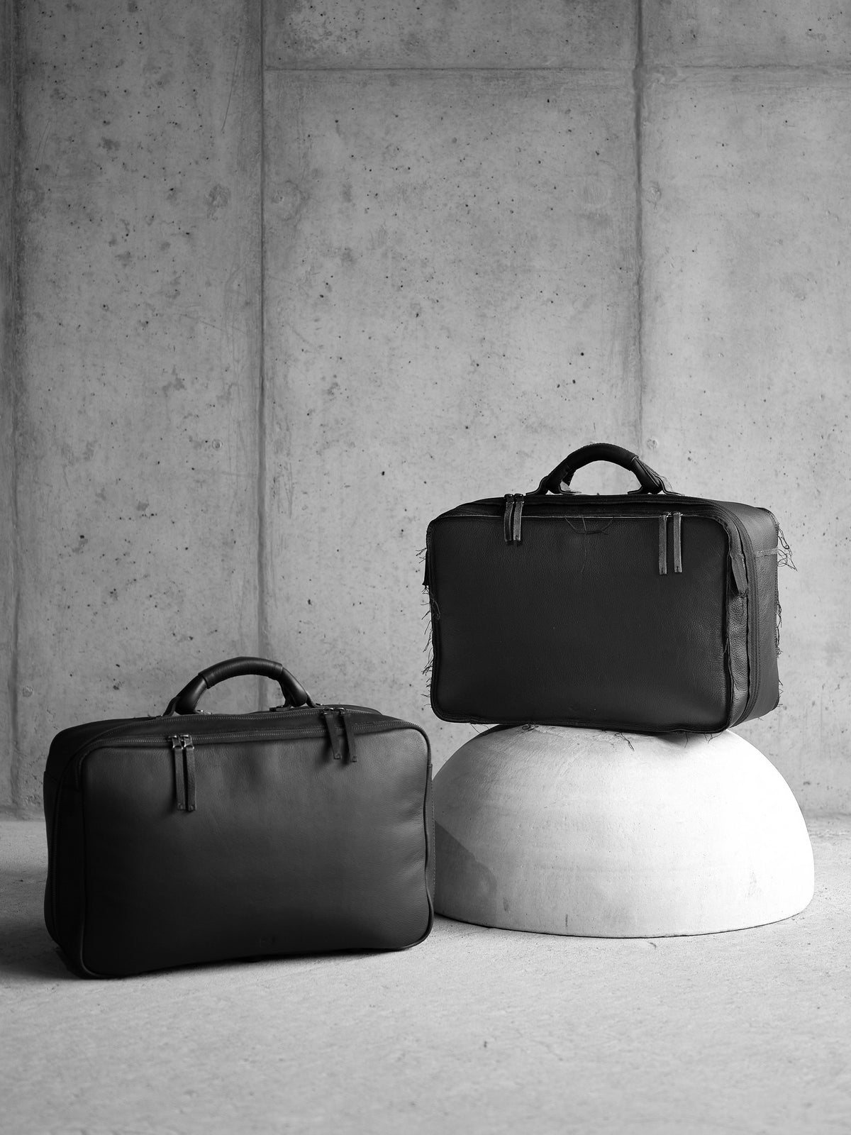 Designer duffle bags by Capra Leather